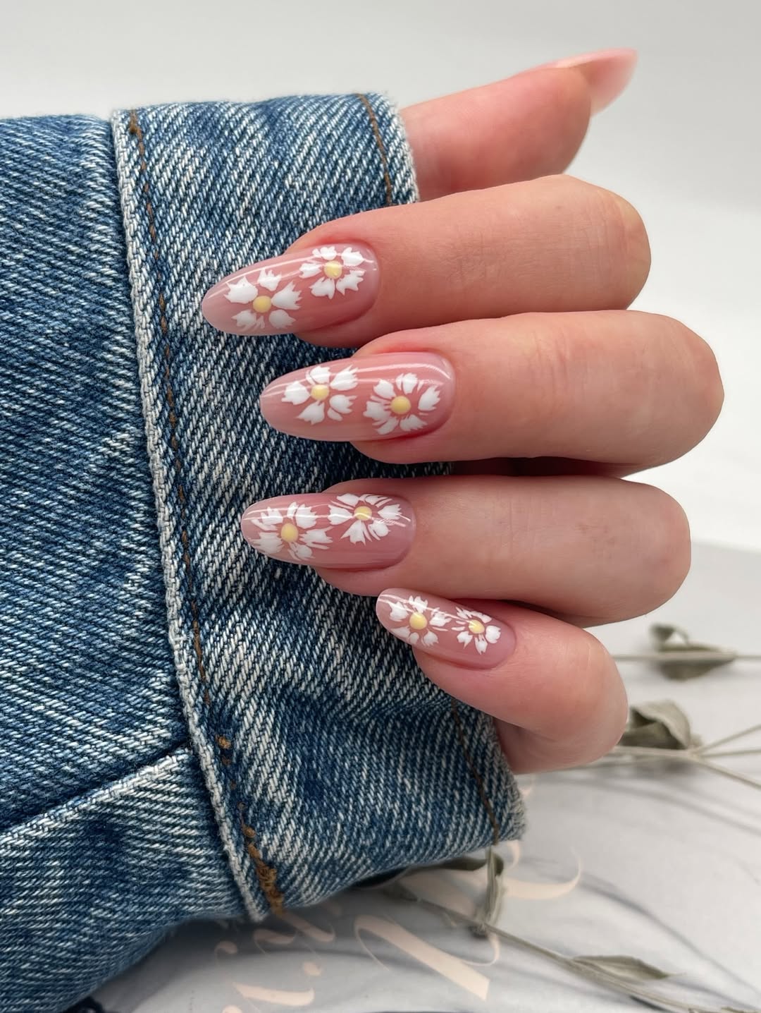 Soft Pink Almond Nails with Hand-Painted Daisy Art