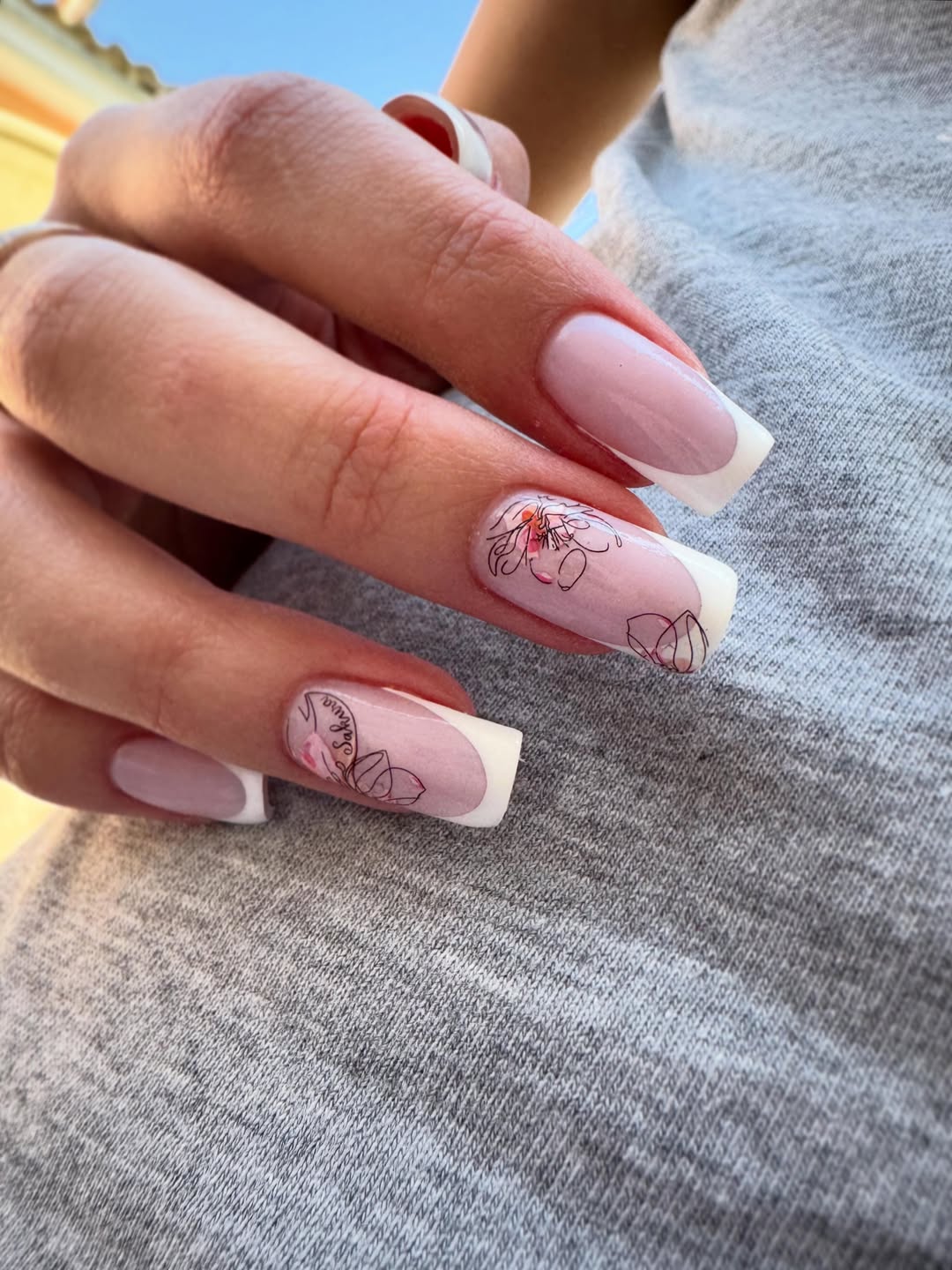 Soft Pink French Tips with Floral Art Details