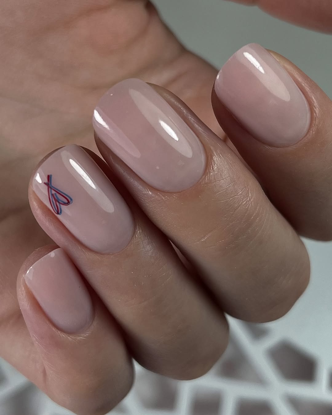 Soft Pink Jelly Oval Nails with Minimal Heart Art