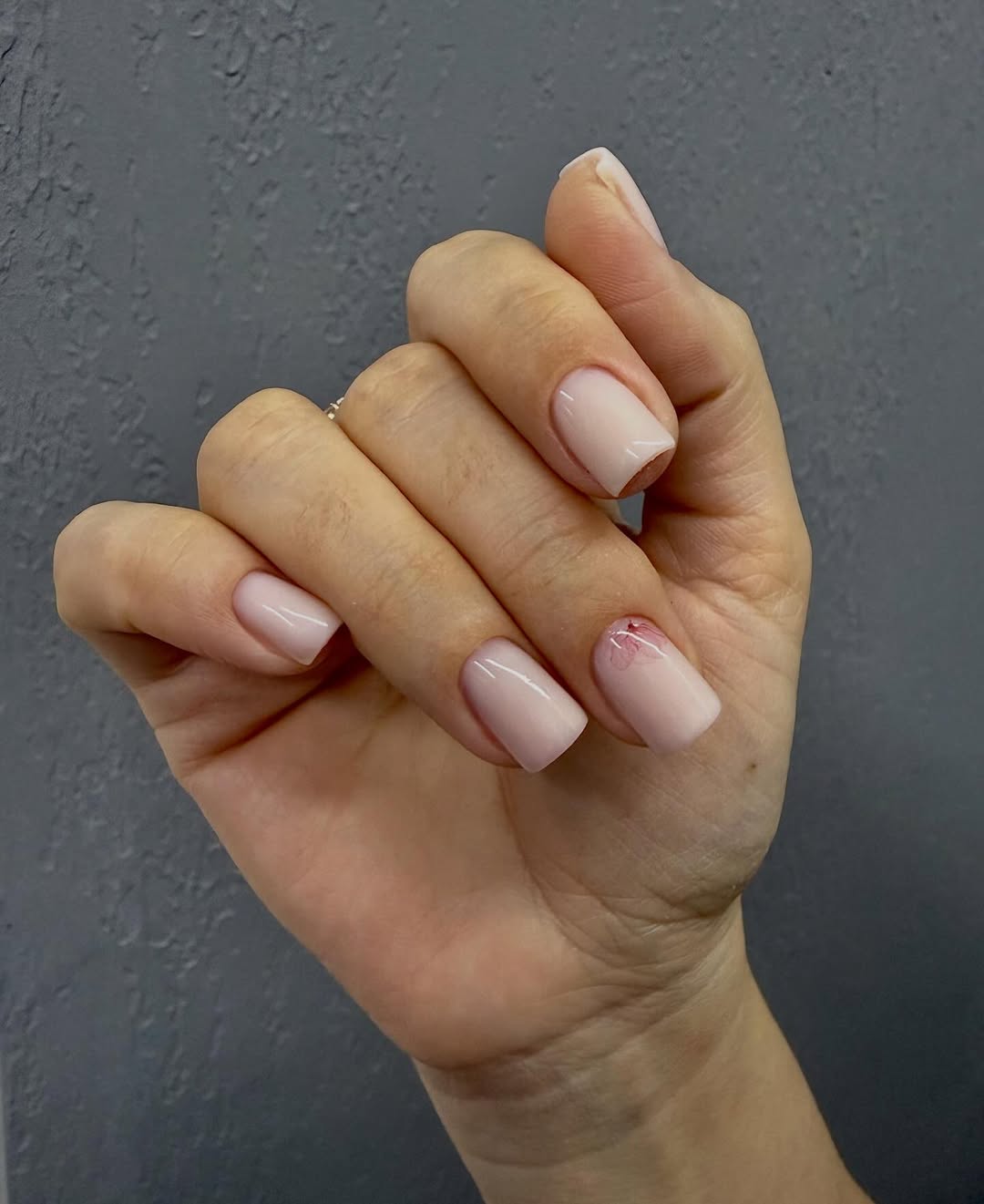 Soft Pink Squoval Nails with Delicate Floral Accent