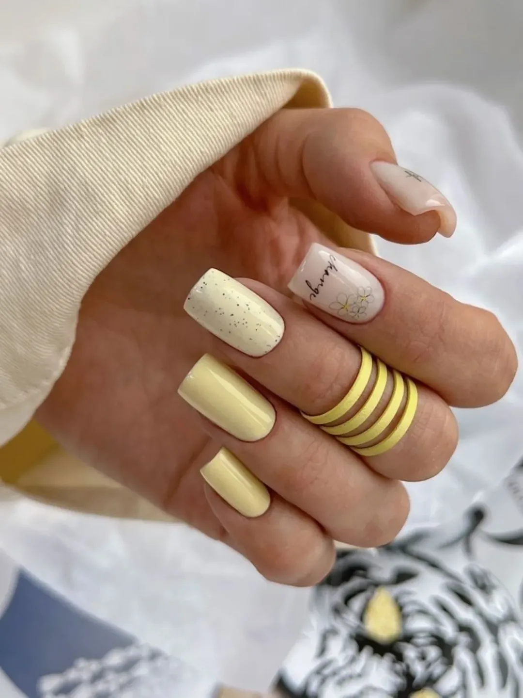 Soft Yellow Speckled and Floral Square Nails