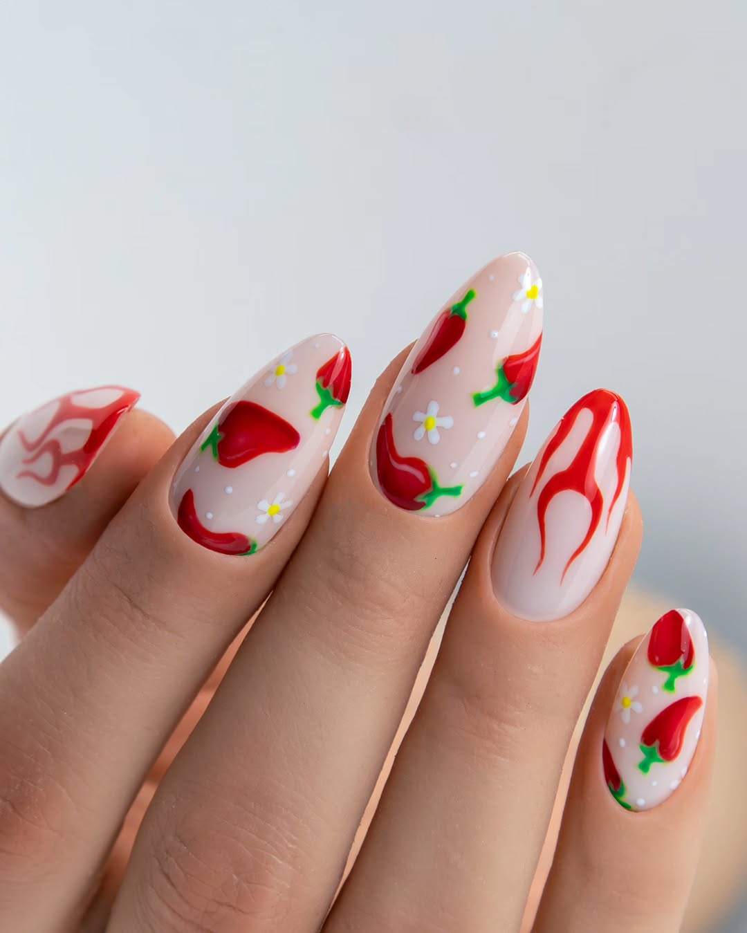 Spicy Chili Pepper And Swirl Glossy Almond Nails