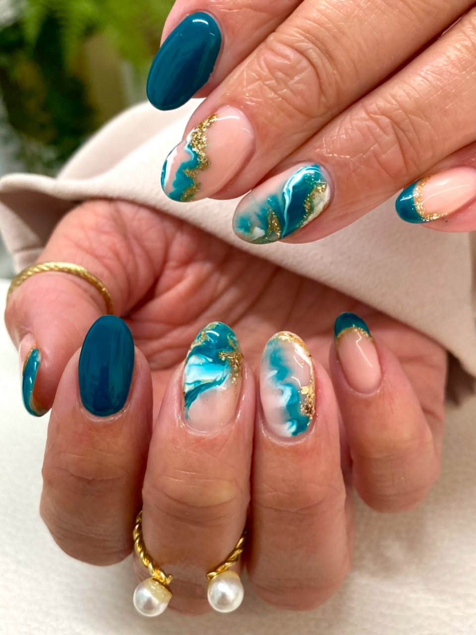 Teal Ocean Swirls with Gold Foil Almond Nails