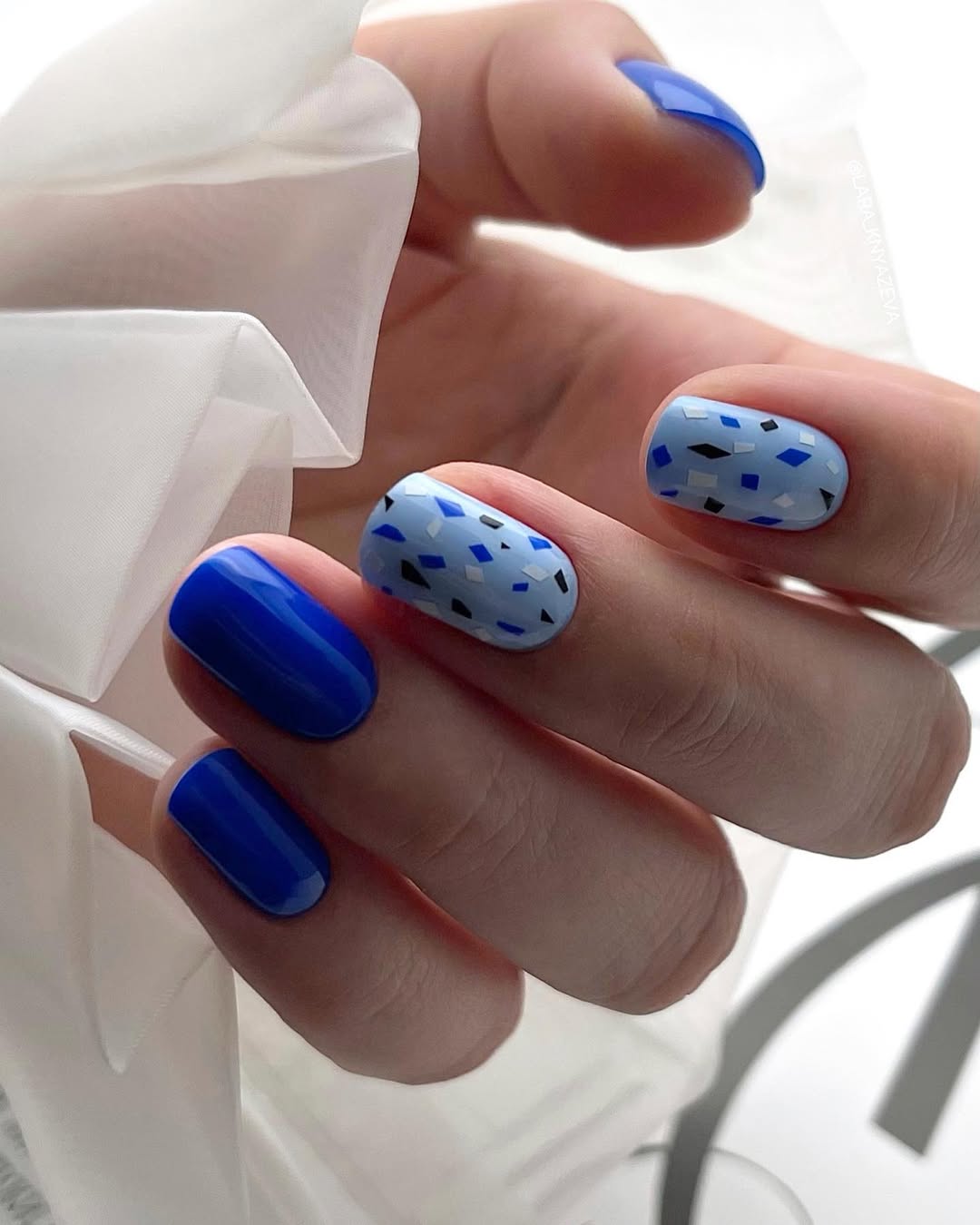 Vibrant Blue Confetti Short Round Nails