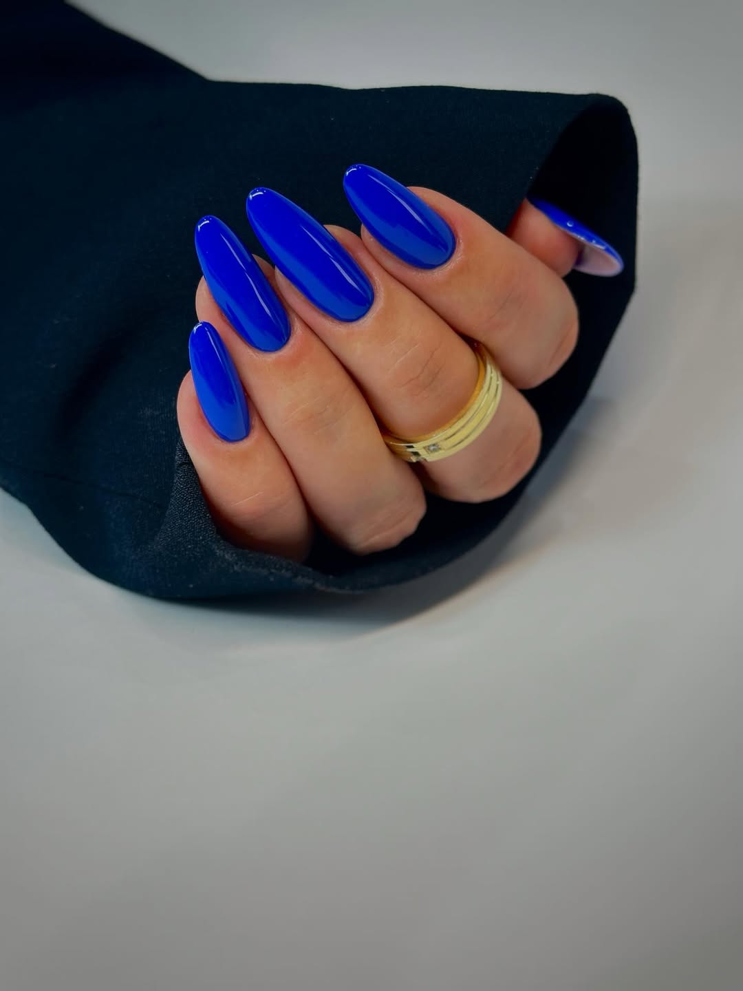Vibrant Cobalt Blue Glossy Almond Nails