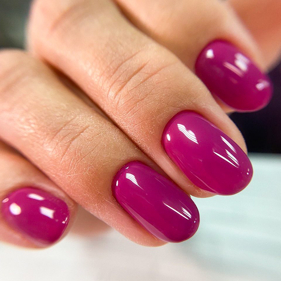 Vibrant Fuchsia Glossy Oval Nails