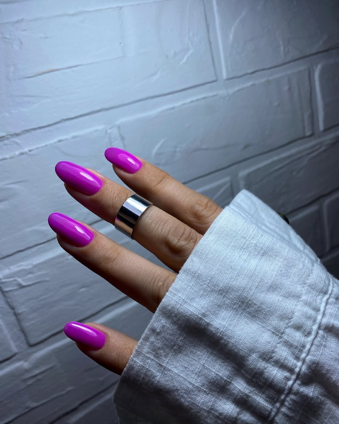 Vibrant Fuchsia Glossy Oval Nails
