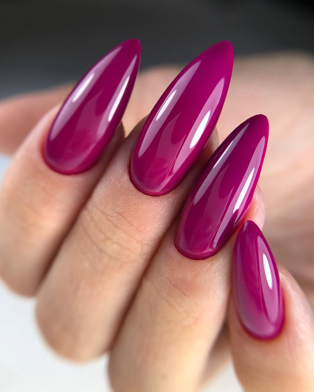 Vibrant Fuchsia Glossy Stiletto Nails