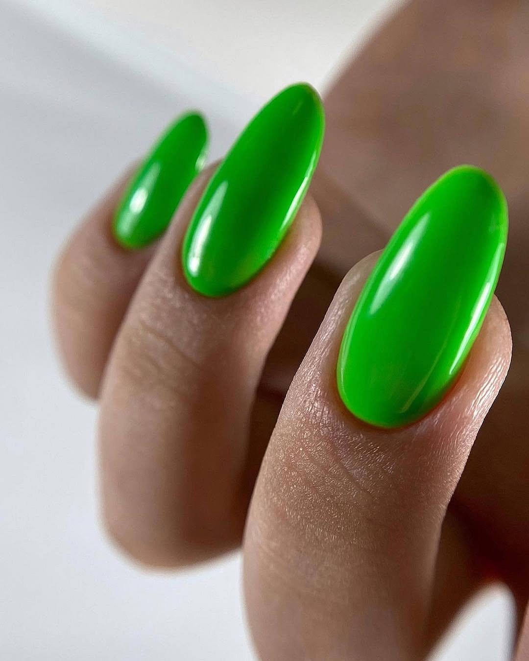 Vibrant Glossy Lime Green Oval Nails