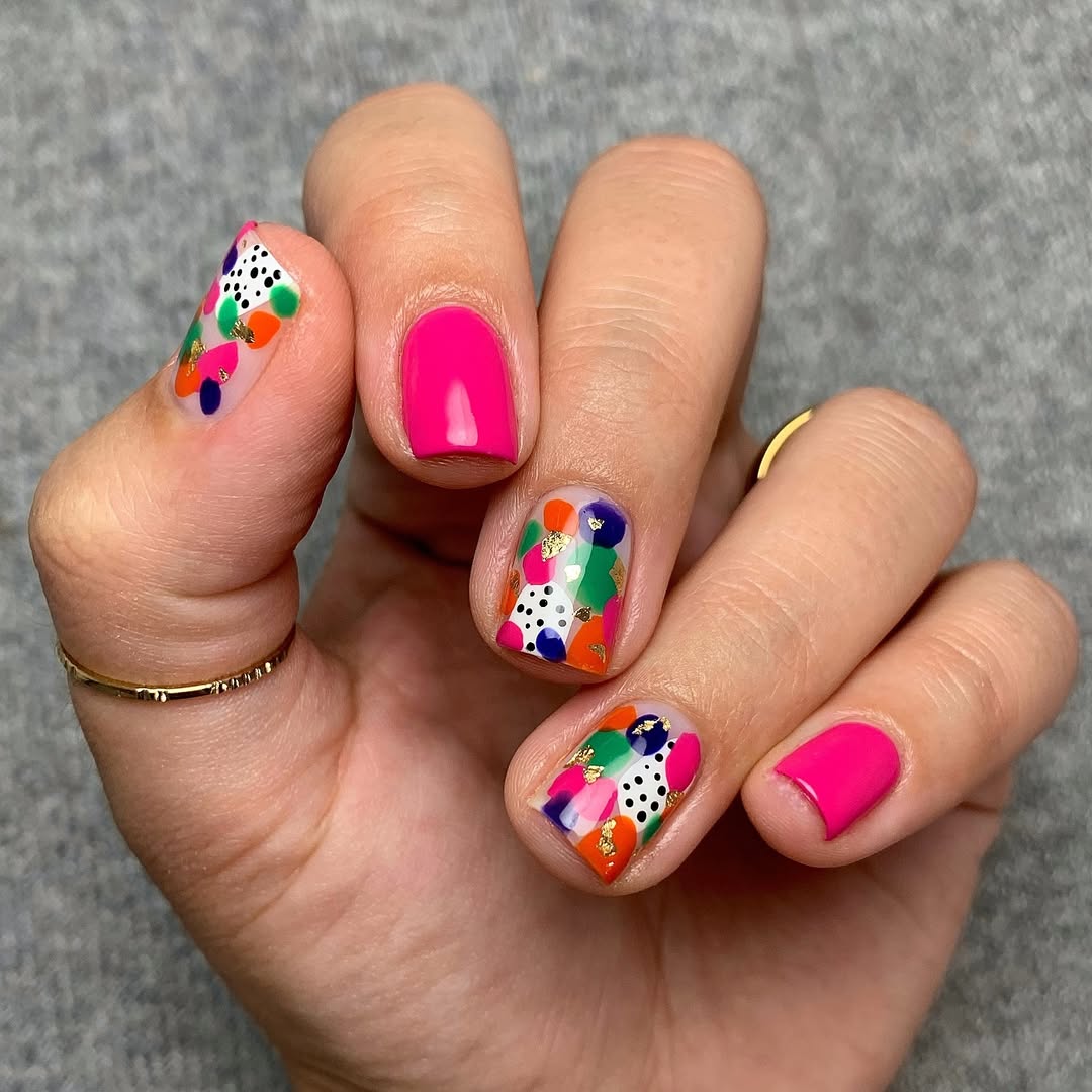 Vibrant Hot Pink and Confetti Abstract Nail Art