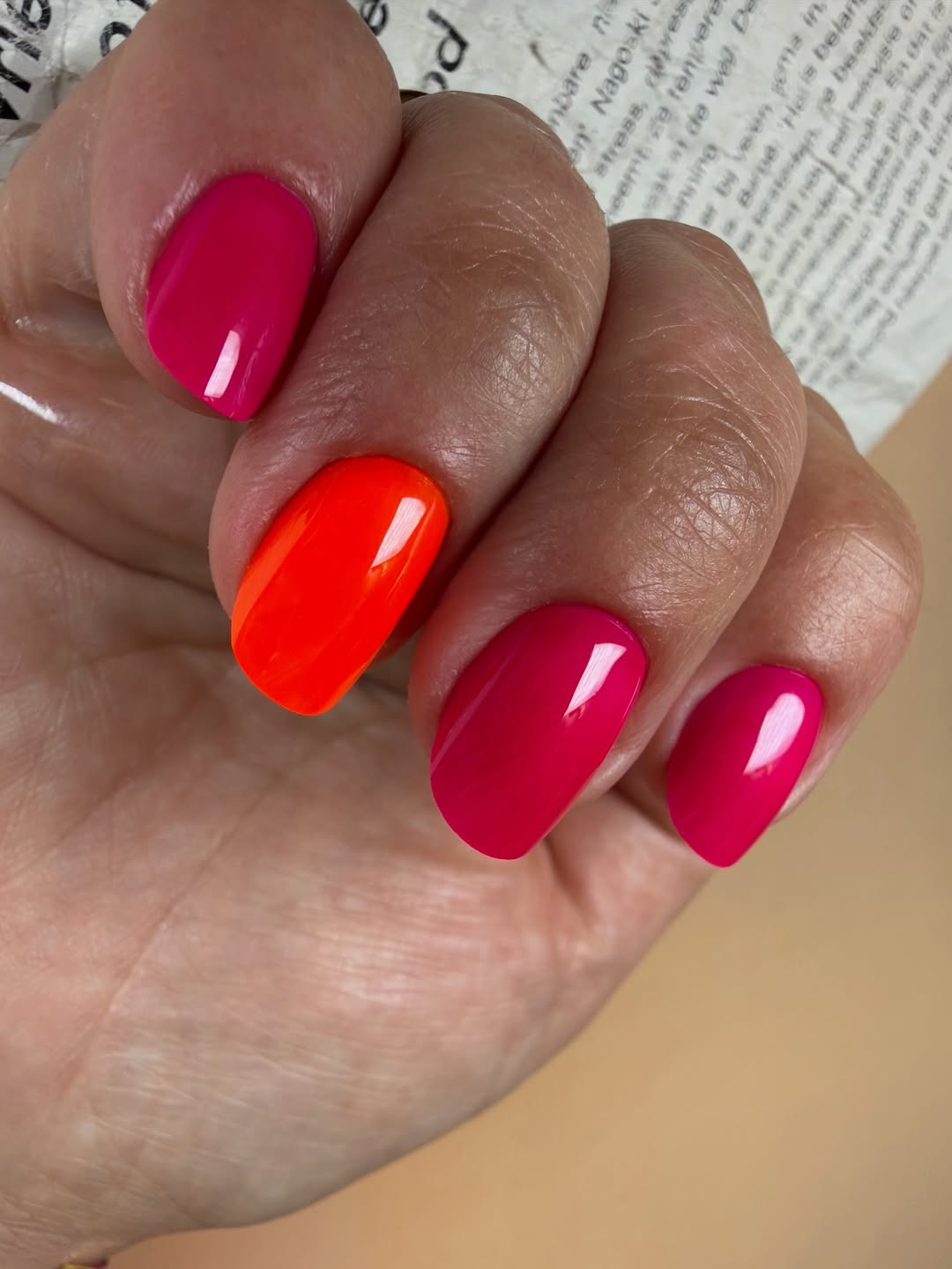 Vibrant Hot Pink and Neon Orange Glossy Oval Manicure