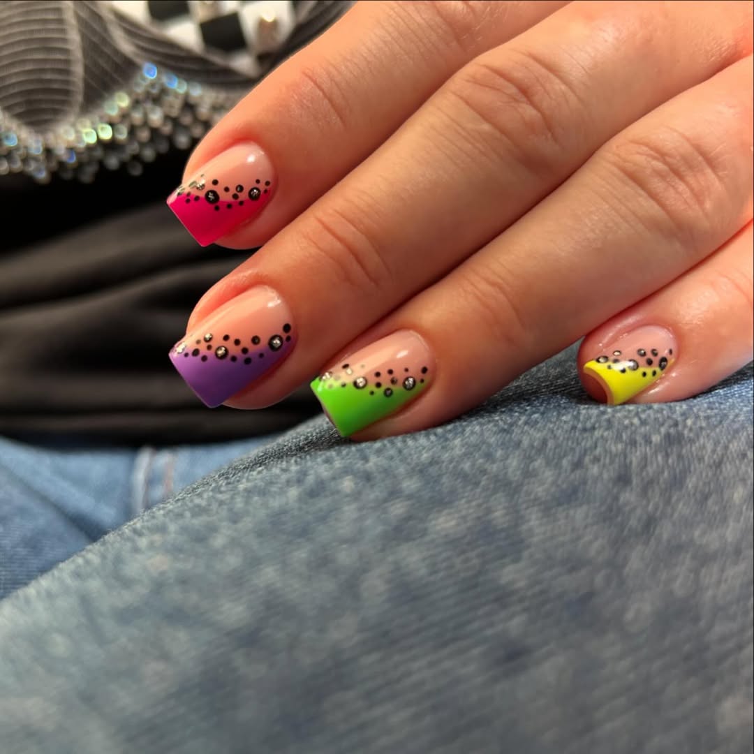 Vibrant Neon French Tips with Polka Dot Accents