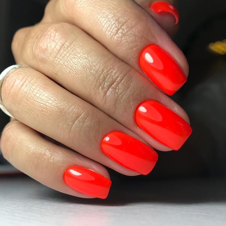 Vibrant Neon Orange Glossy Short Oval Nails