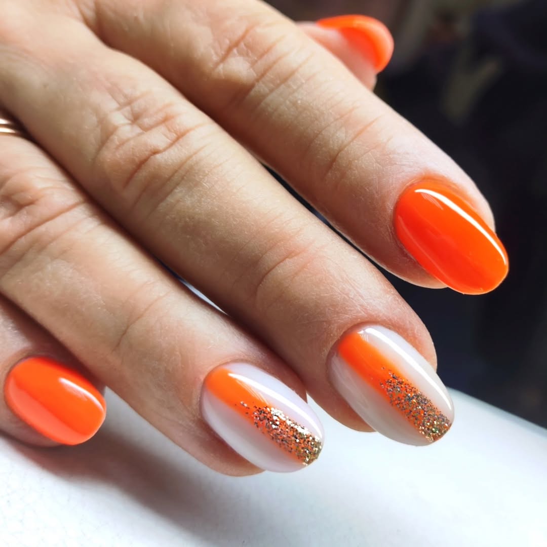 Vibrant Orange Diagonal Glitter Accent Glossy Oval Nails