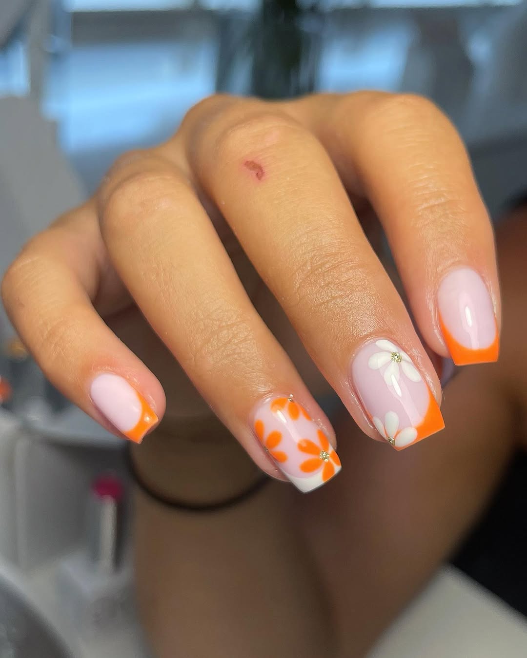 Vibrant Orange French Floral Nails with Milly Base