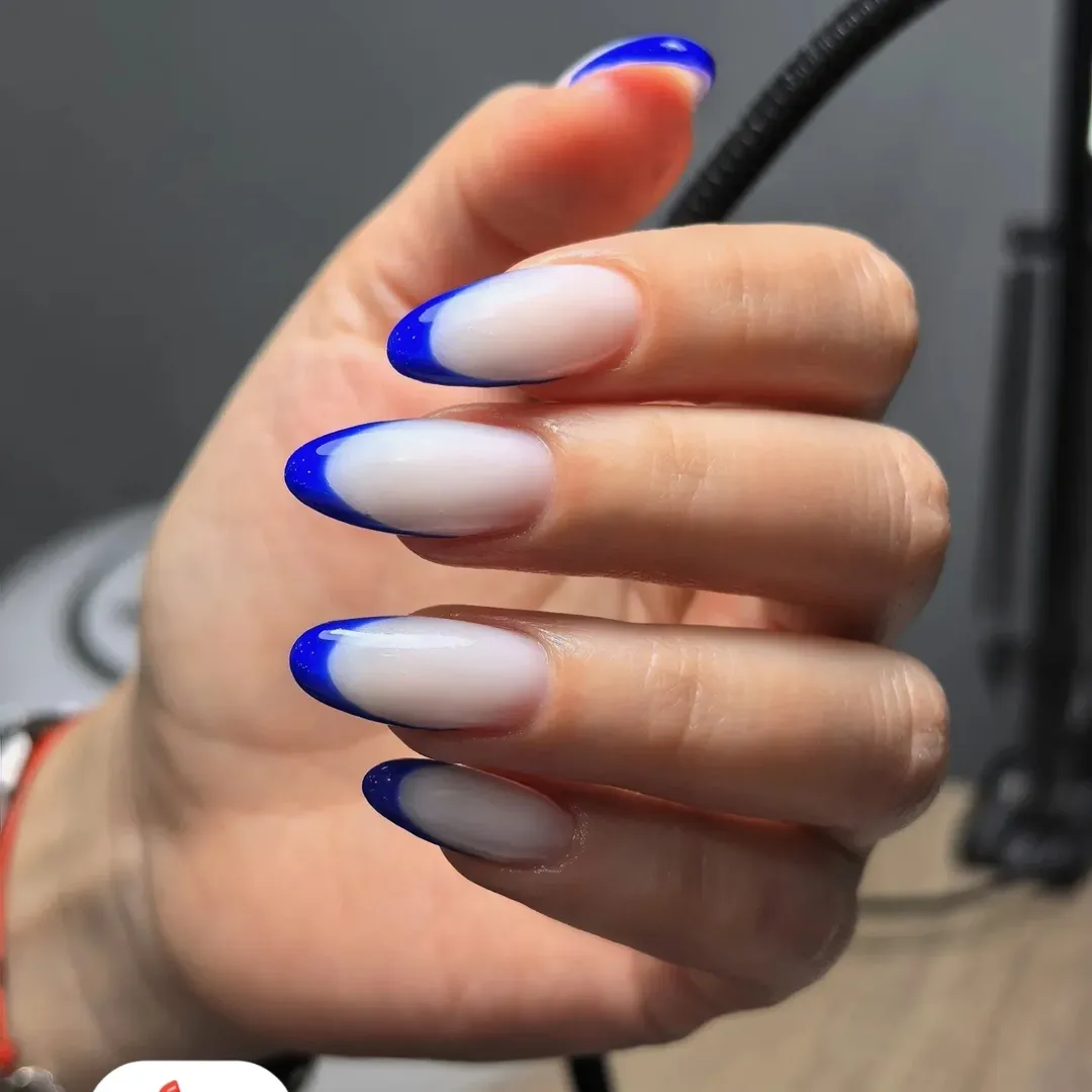 Vivid Blue French Tip Milky Oval Nails