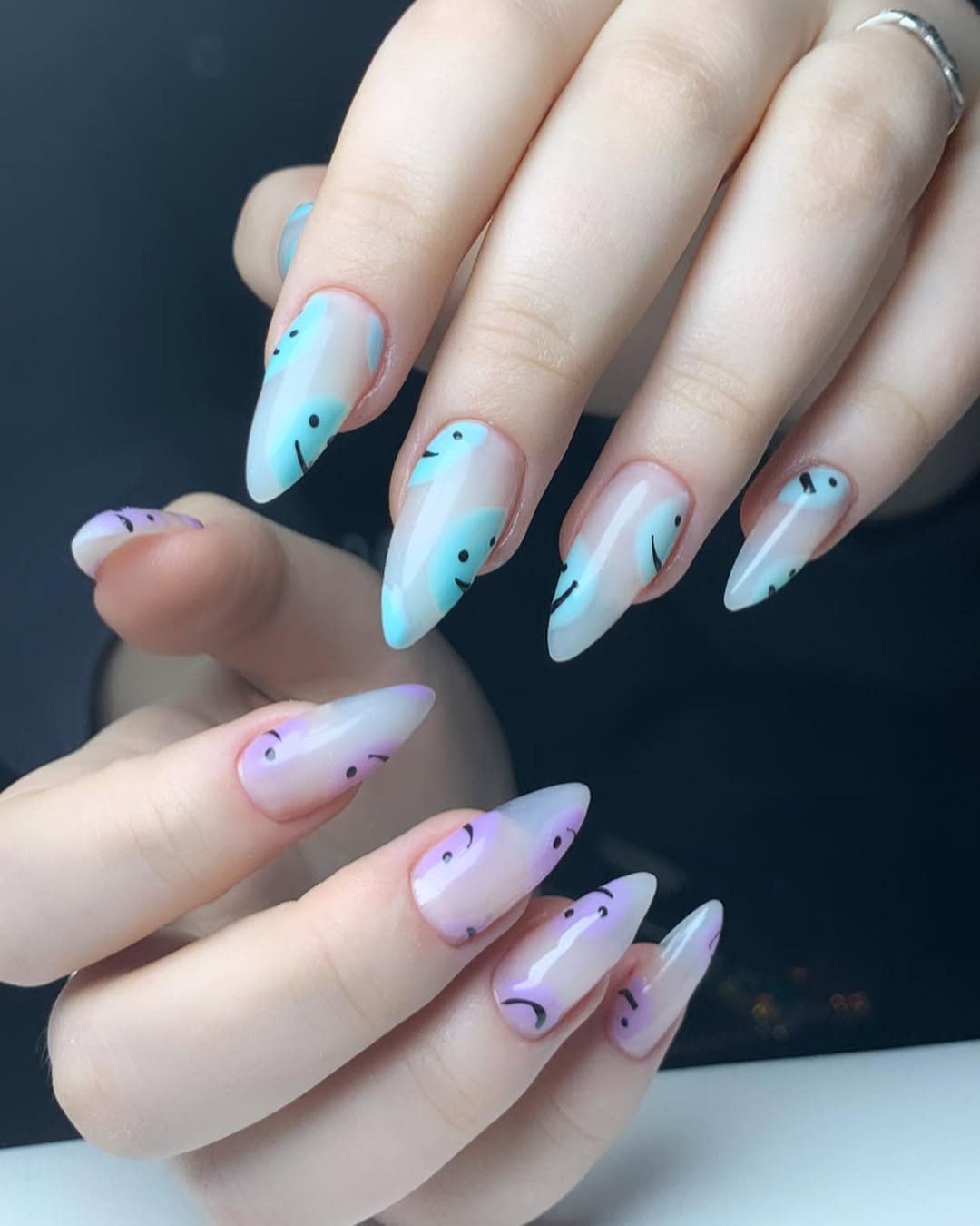 Whimsical Pastel Smiley Faces Stiletto Nails