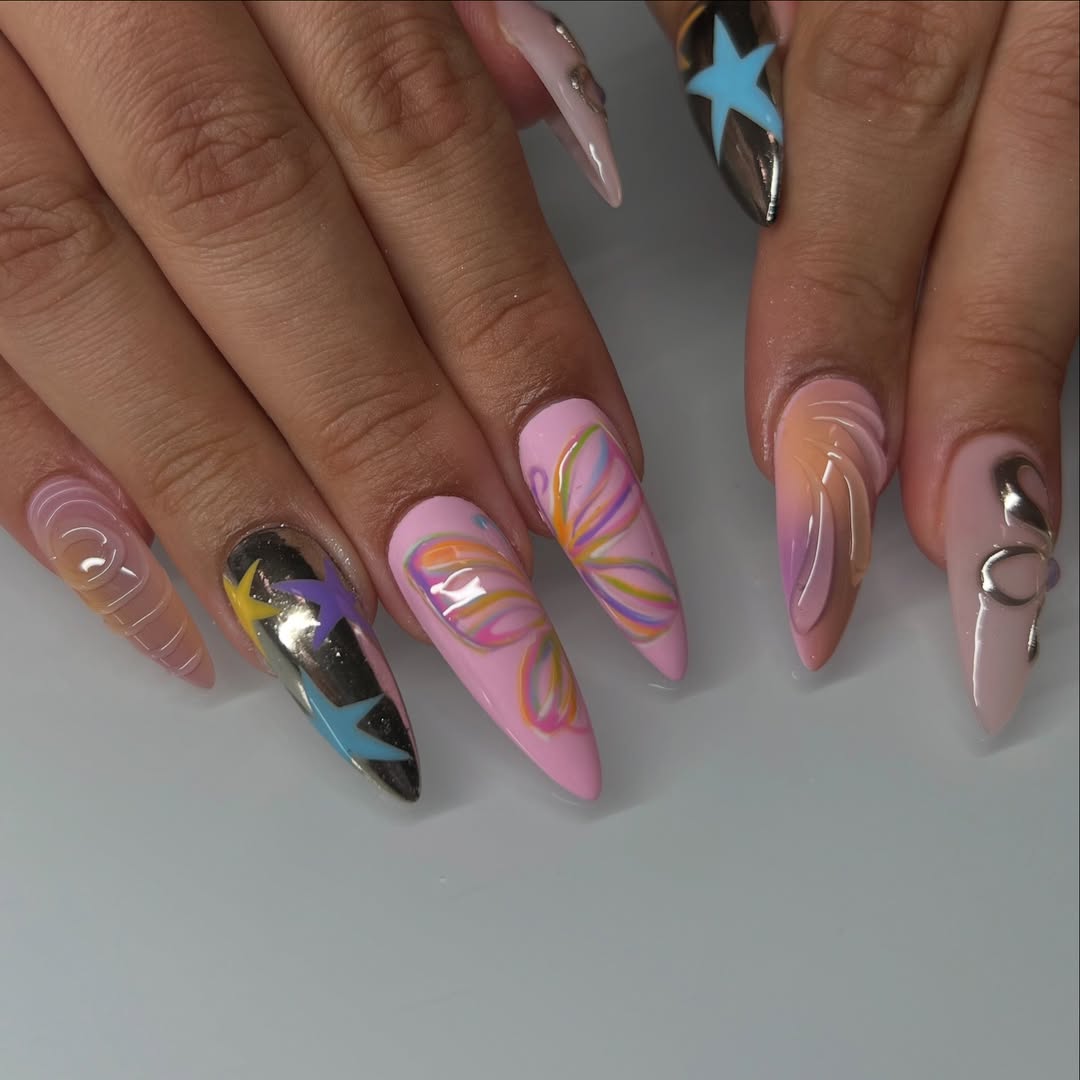 Whimsical Pastel Swirls and Chrome Stars Almond Nails