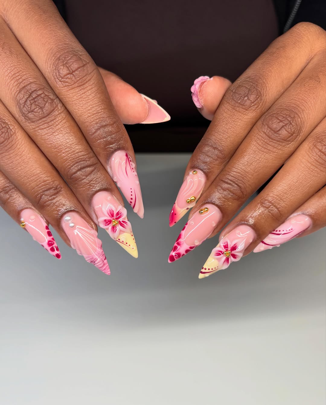 Whimsical Pink Floral Stiletto Nails with 3D Accents