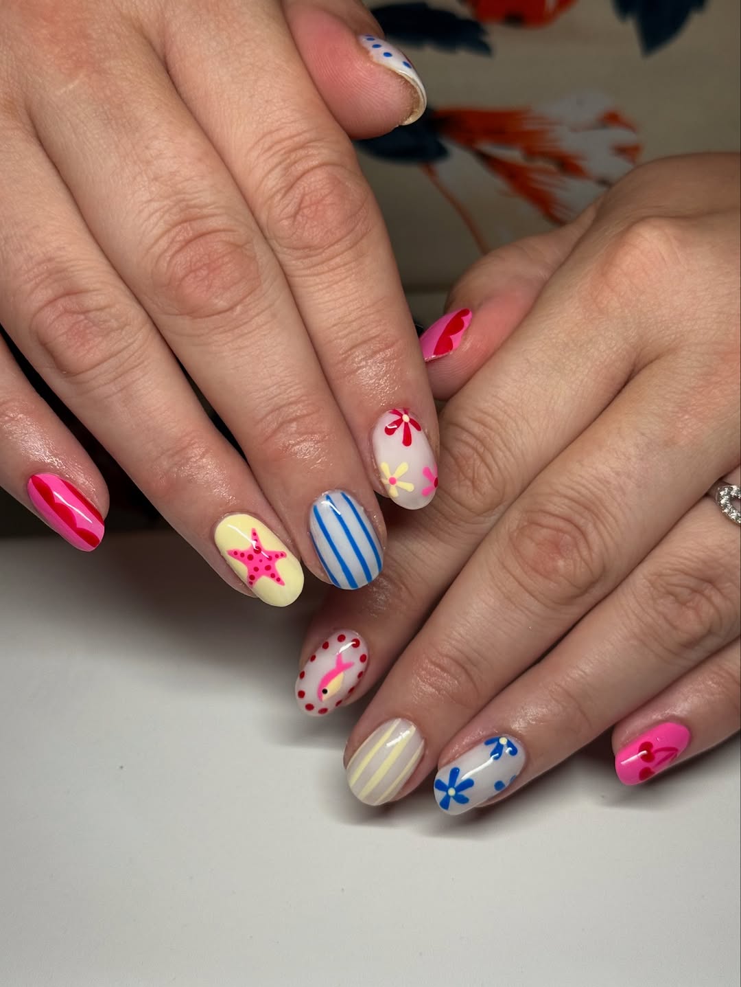 Whimsical & Playful Summer Art Short Oval Gel Nails