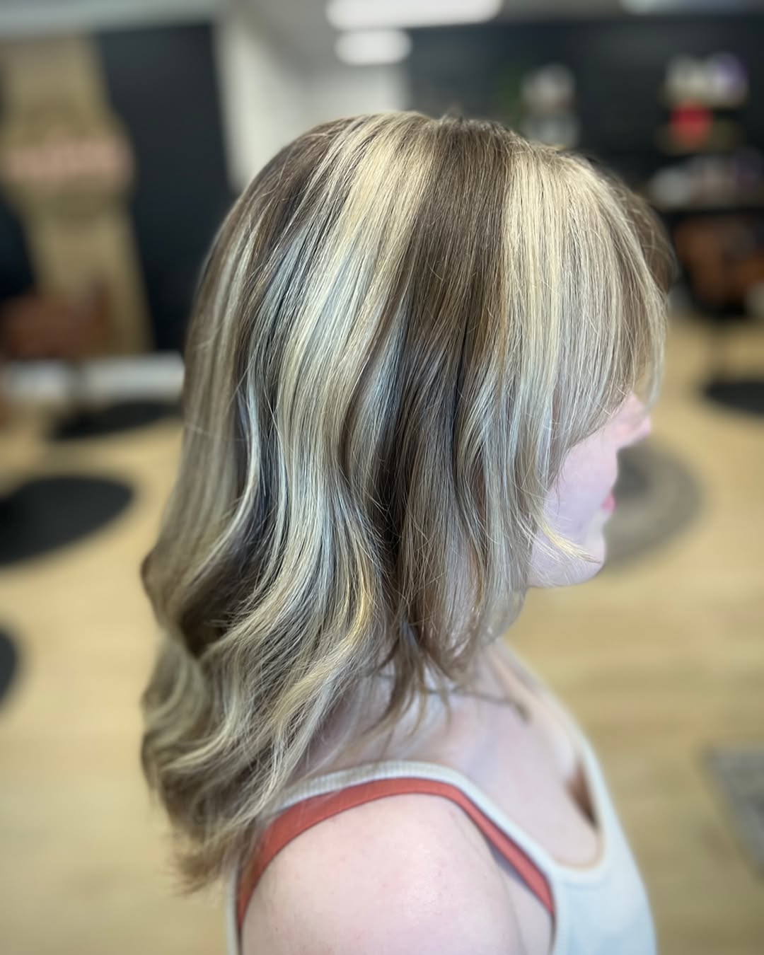 Ash Blonde Skunk Stripe On Brunette Layers