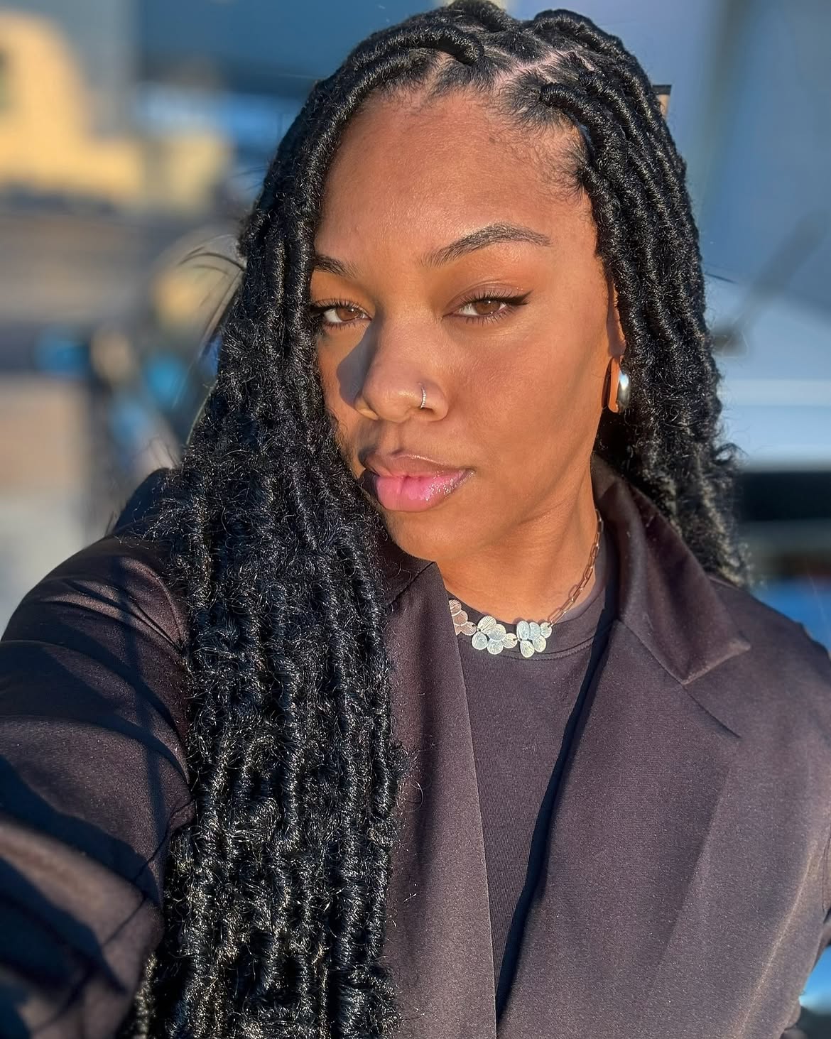 Bohemian Butterfly Locs With Defined Curls