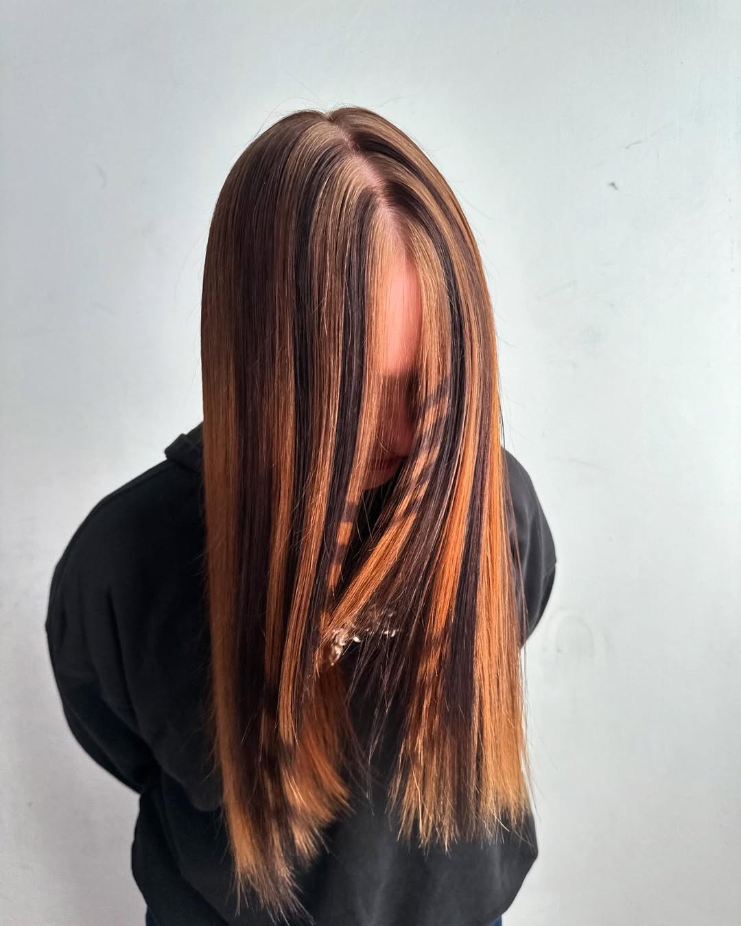 Bold Auburn Skunk Stripe On Dark Brown Hair