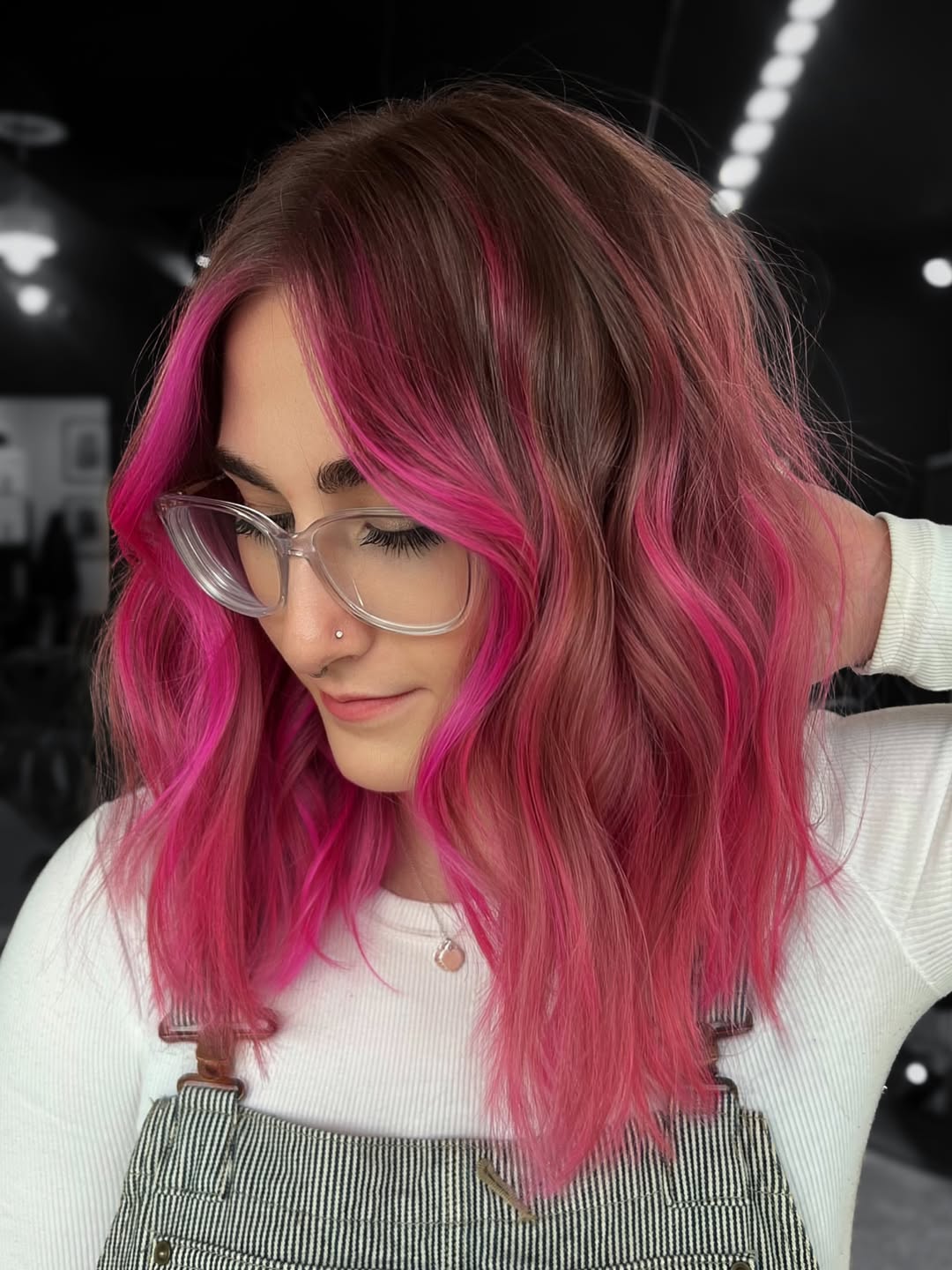 Bold Pink Money Piece On Wavy Brunette Lob