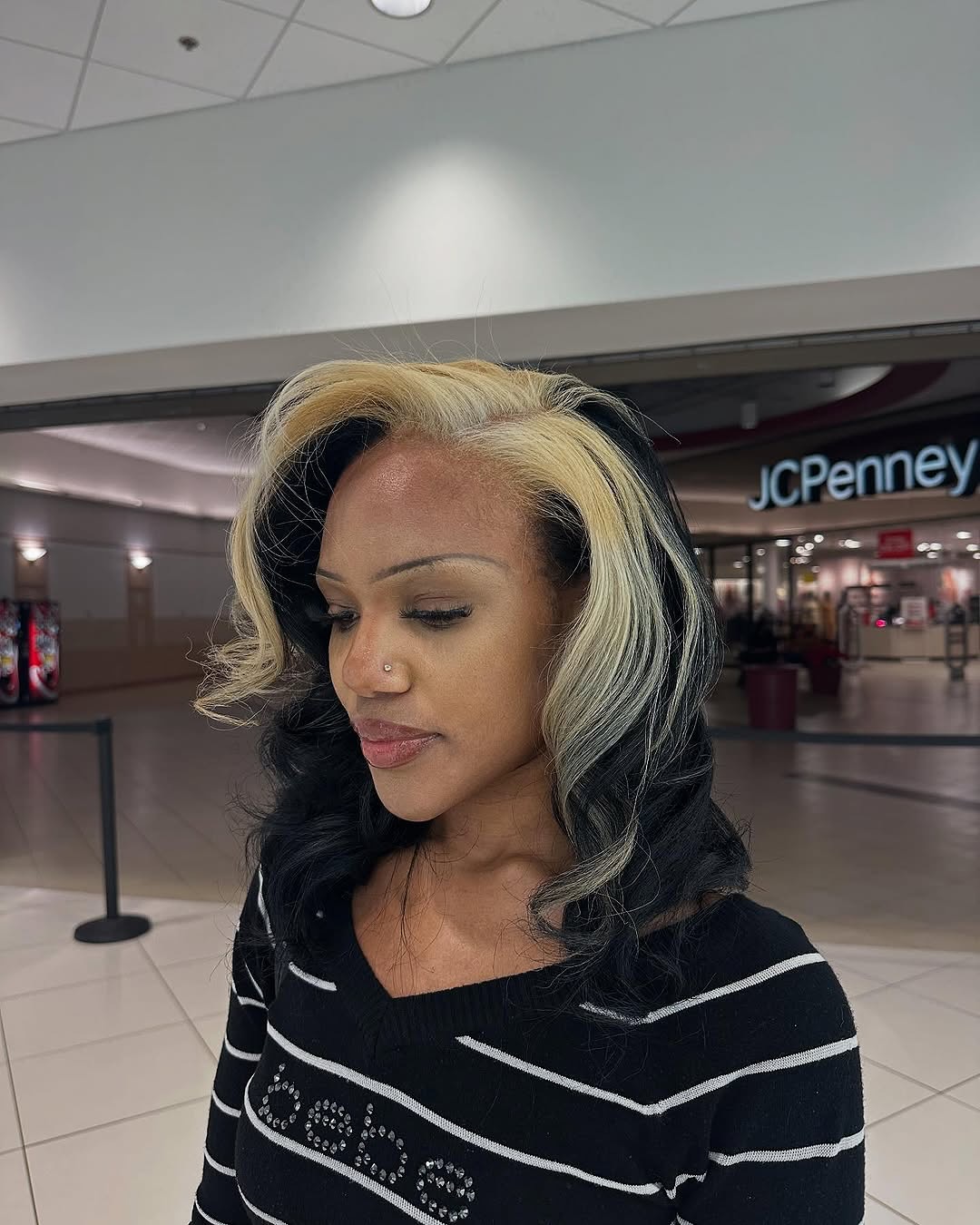 Bold Skunk Stripe Lob with Voluminous Curls