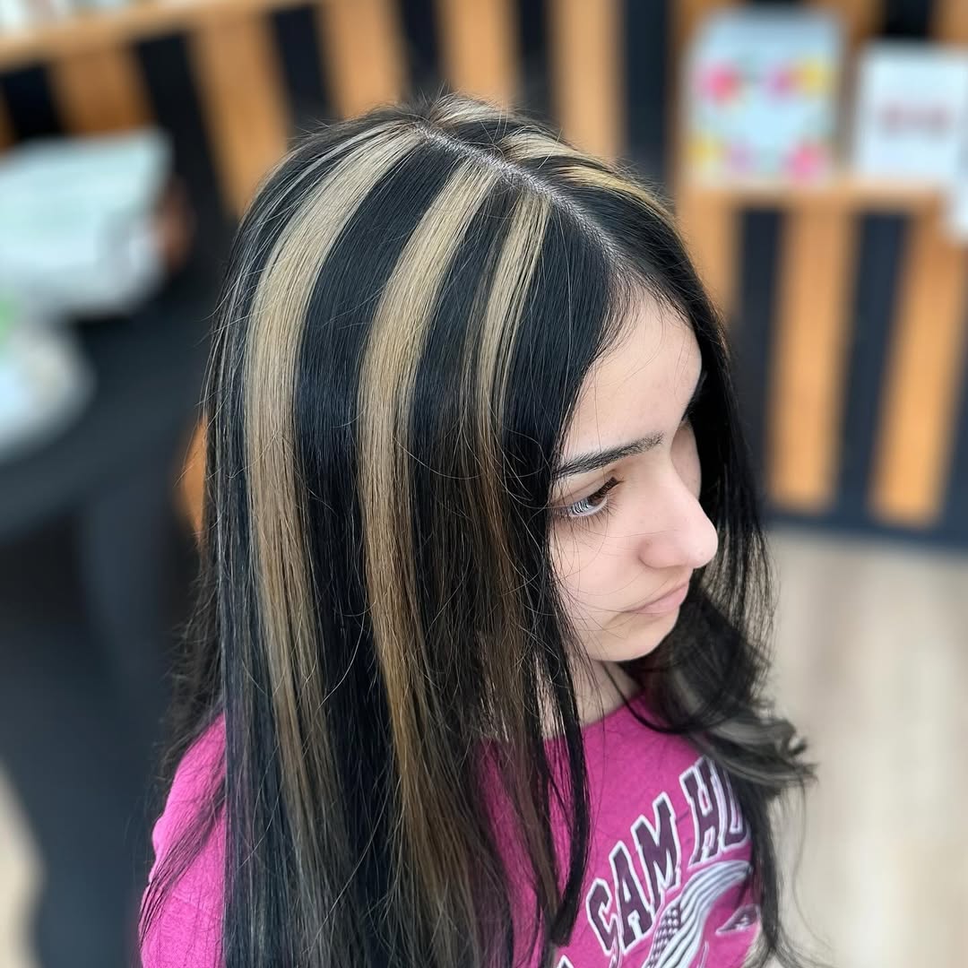 Bold Skunk Stripe Lowlights On Long Dark Hair