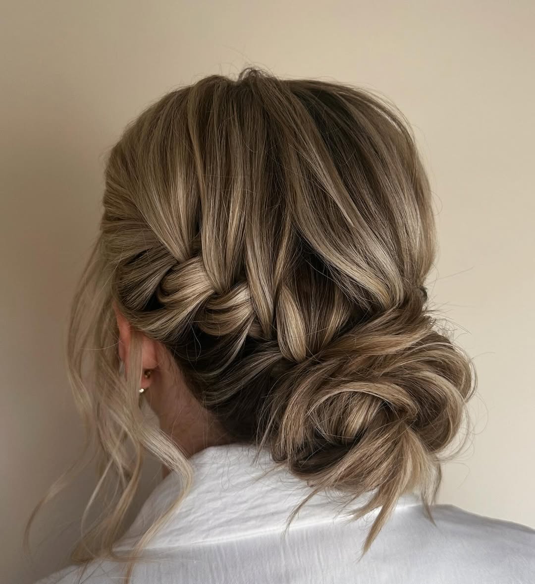 Braided Low Messy Bun Medium Length Hair