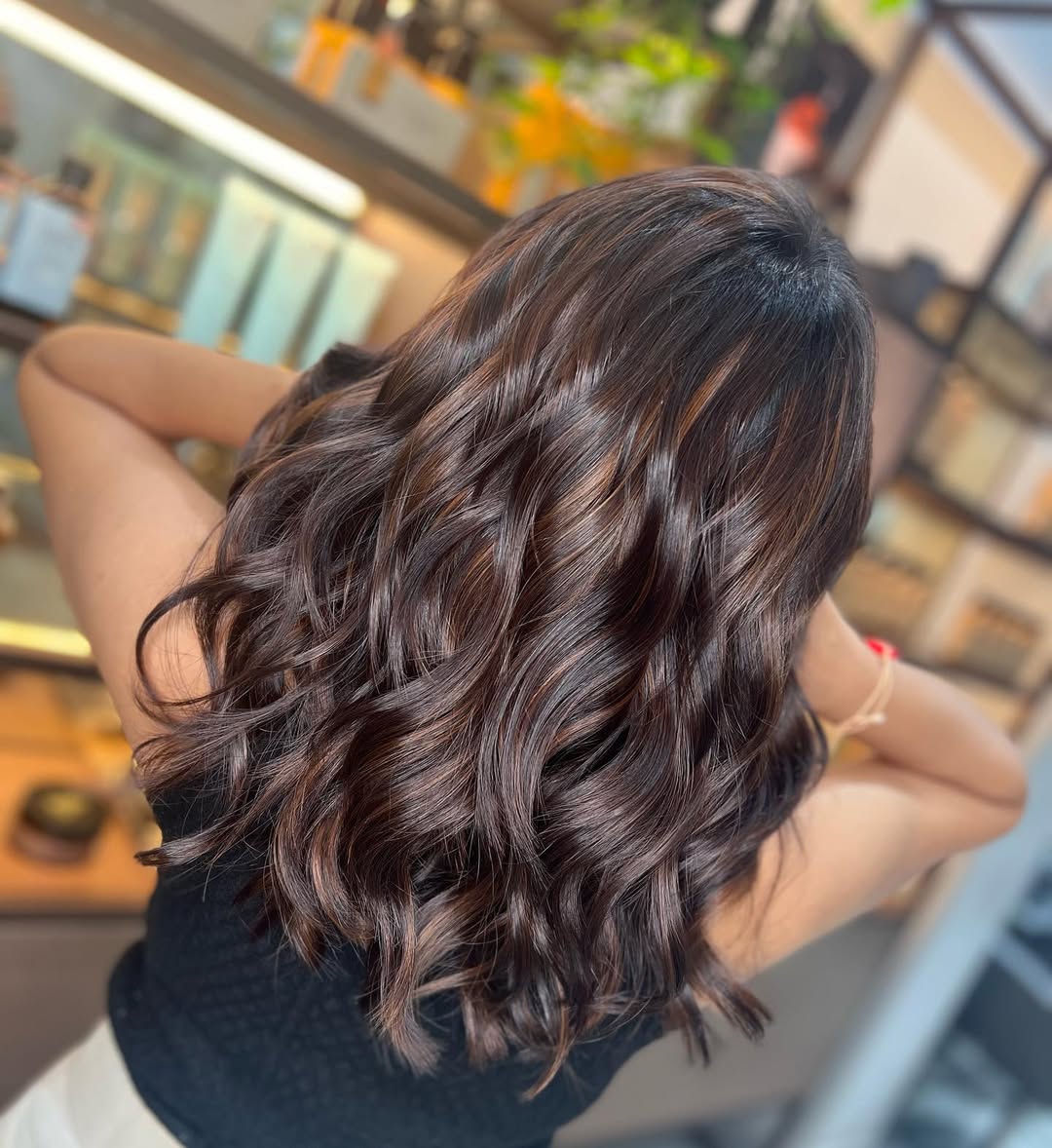 Caramel Swirl Highlights On Dark Brown Waves