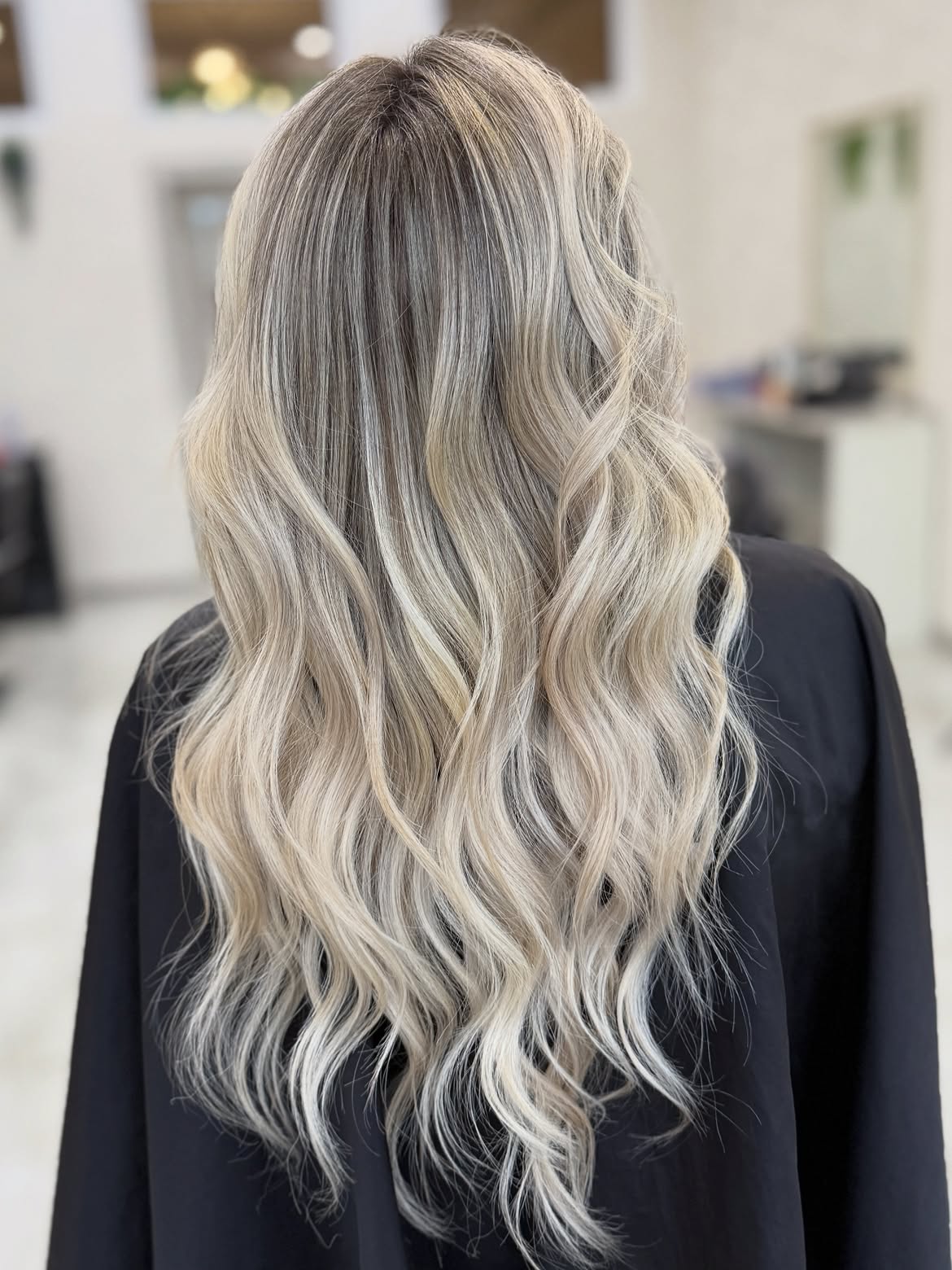 Champagne Blonde Balayage With Loose Waves