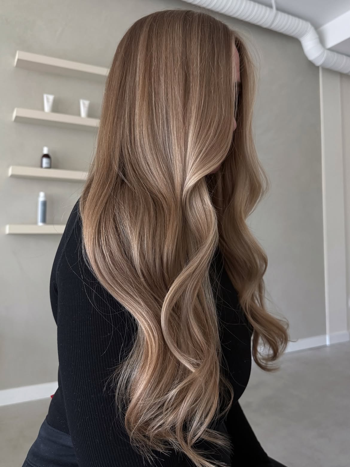Champagne Blonde Balayage With Soft Waves