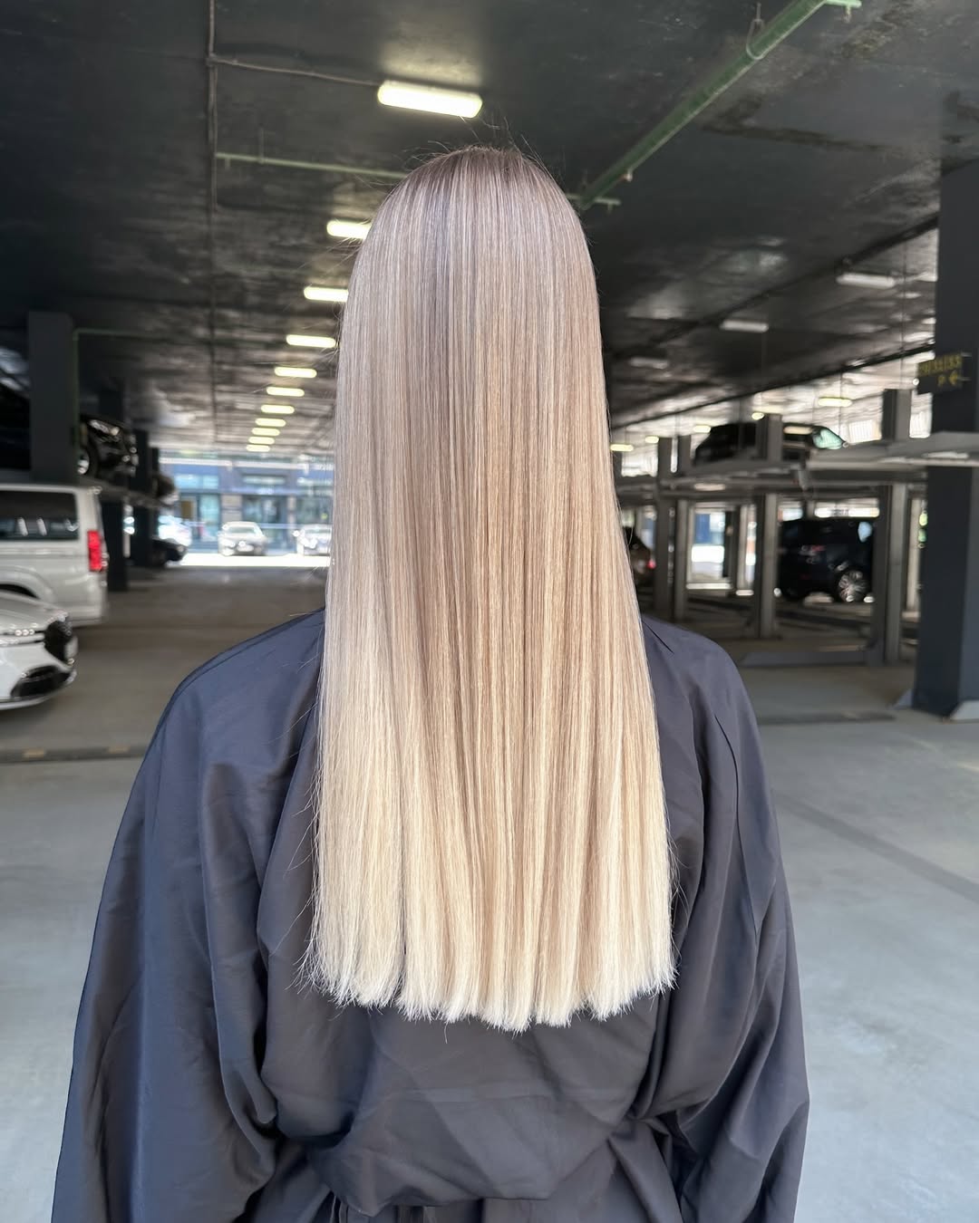 Champagne Blonde Blunt Cut With Subtle Root Smudge