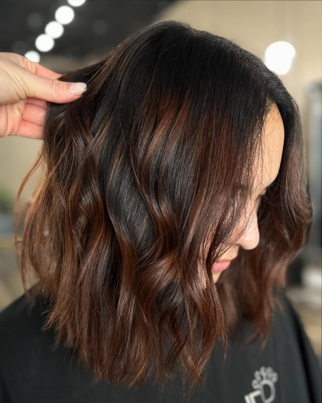 Chic Copper Highlights On Dark Brown Lob