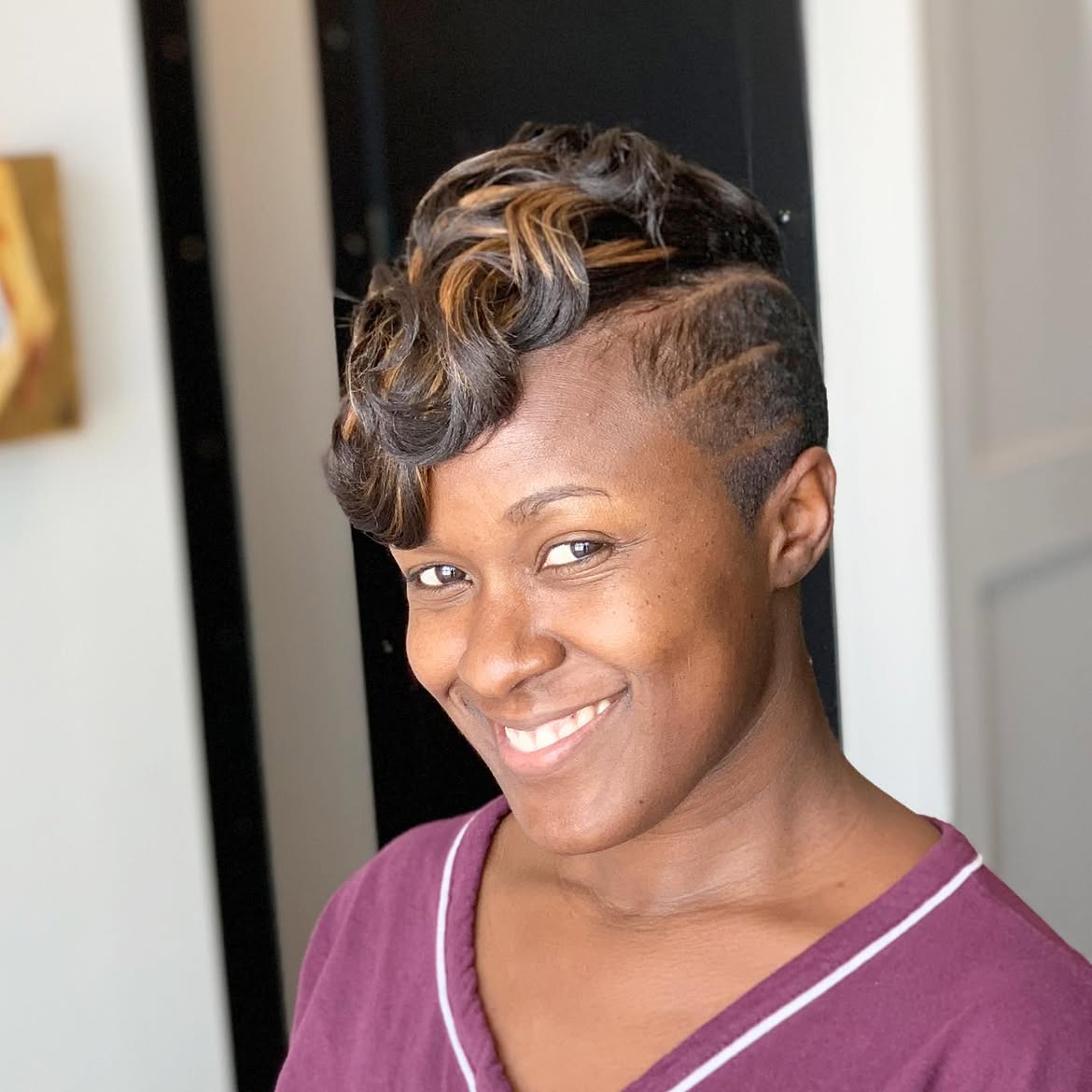 Chic Undercut With Rolled Coils and Caramel Highlights