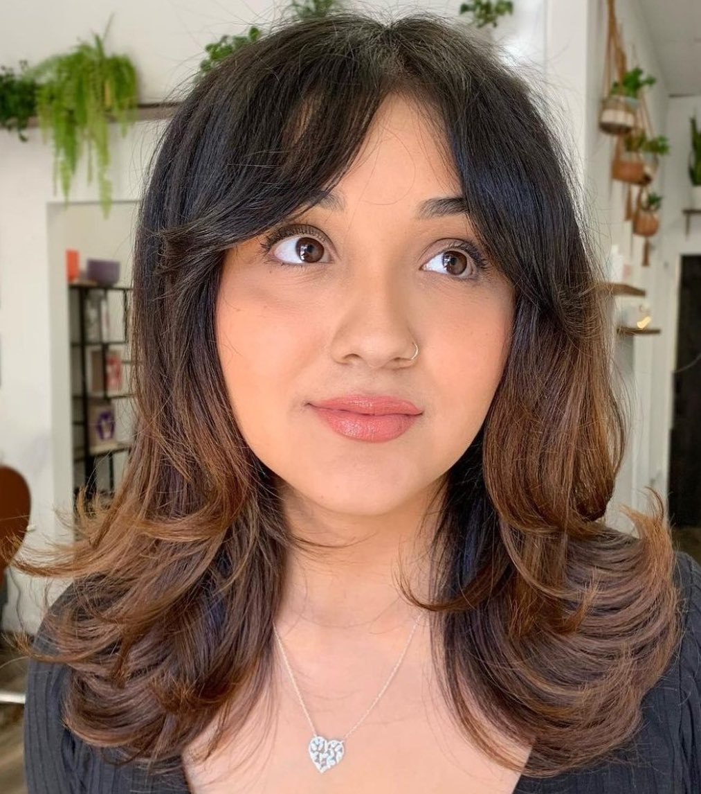 Choppy Chestnut Lob With Face-Framing Curtain Bangs
