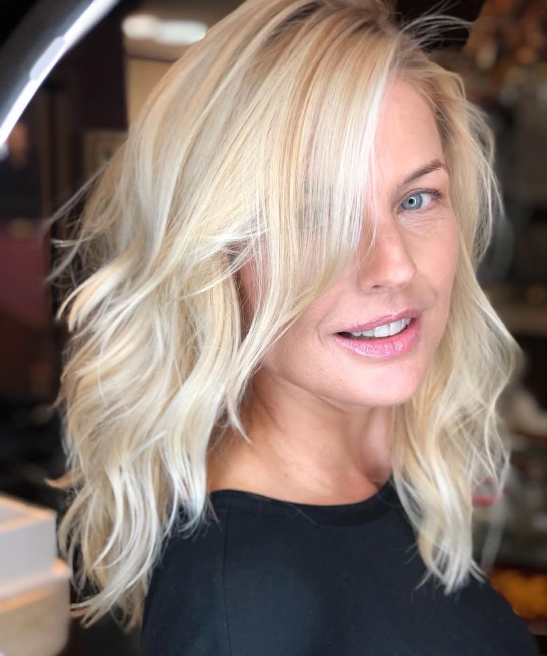 Choppy Golden Blonde Lob With Side-Swept Bangs