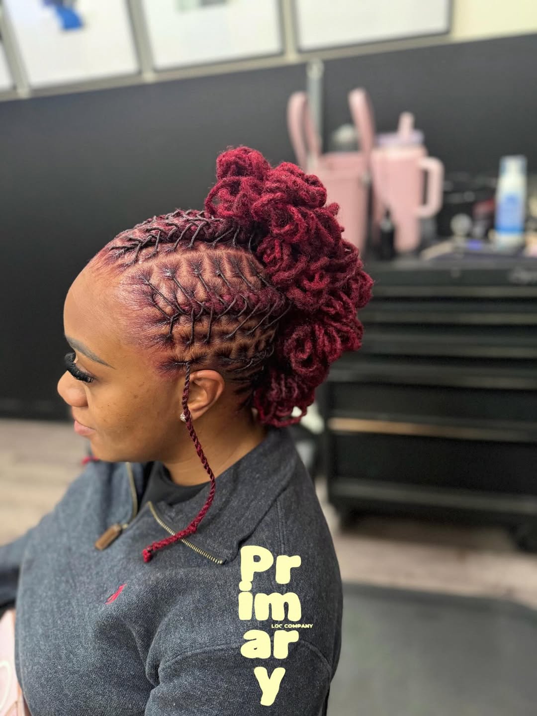 Crimson Faux Loc Mohawk With Intricate Parting