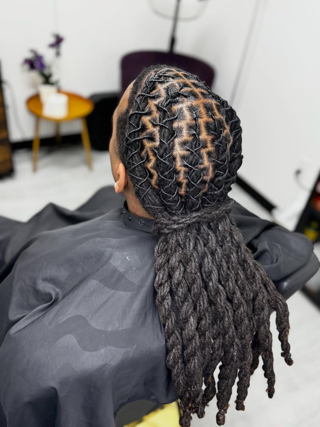 Crisscross Grid Locs With Long Cascading Ponytail