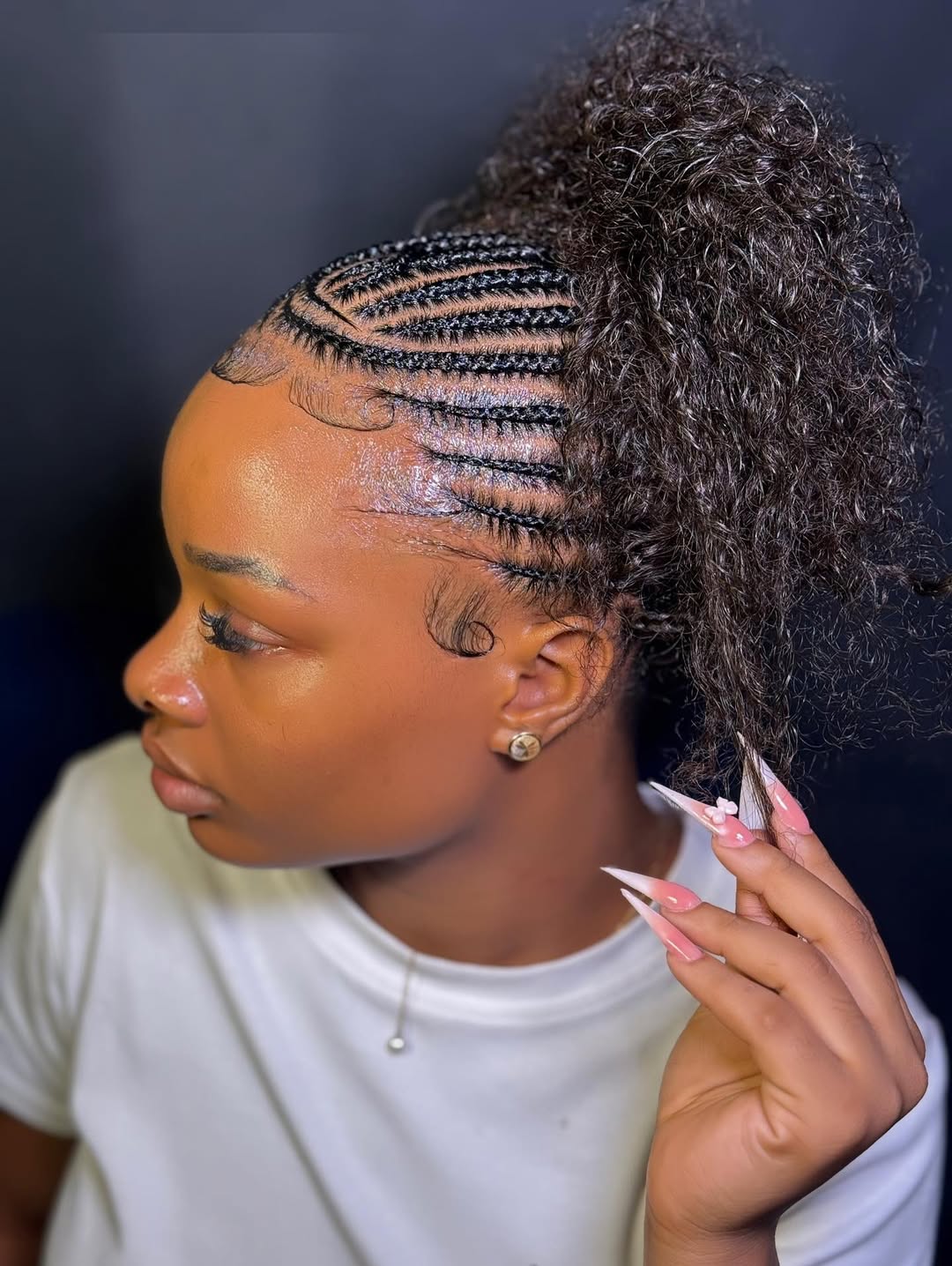Defined Cornrow Braids with Curly High Ponytail