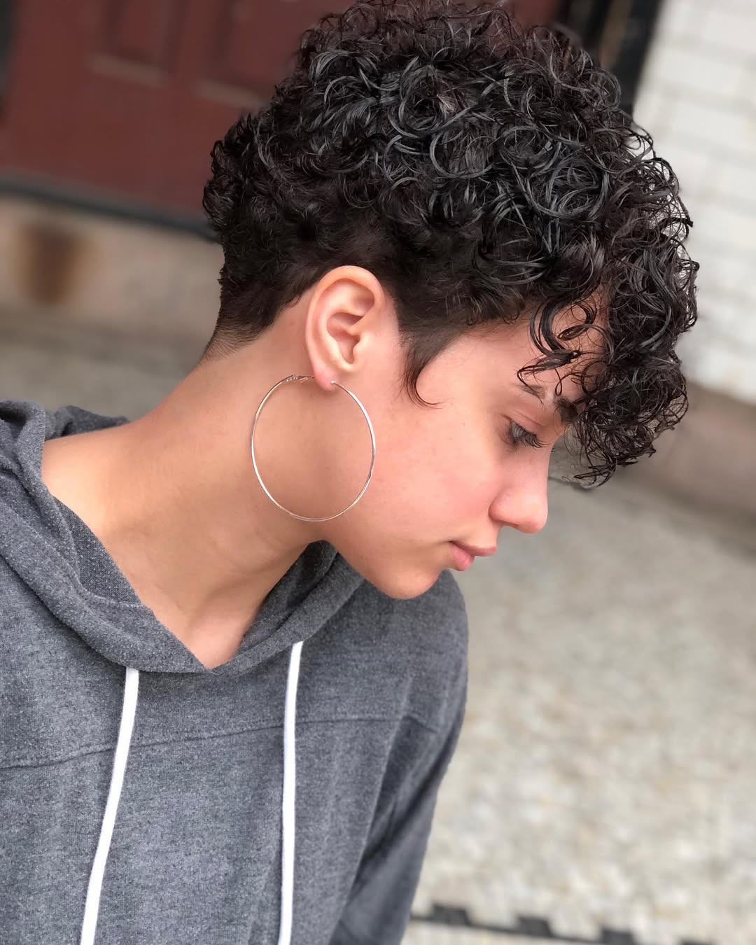Defined Curly Pixie With Tapered Sides