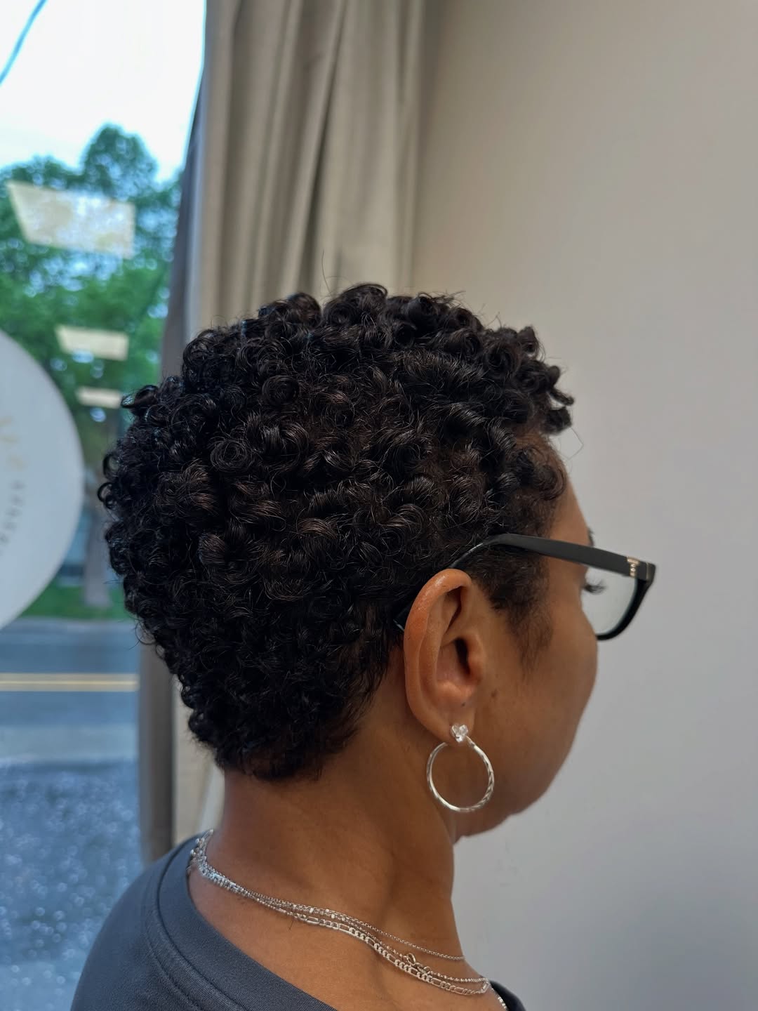 Defined Curly Pixie With Tapered Sides