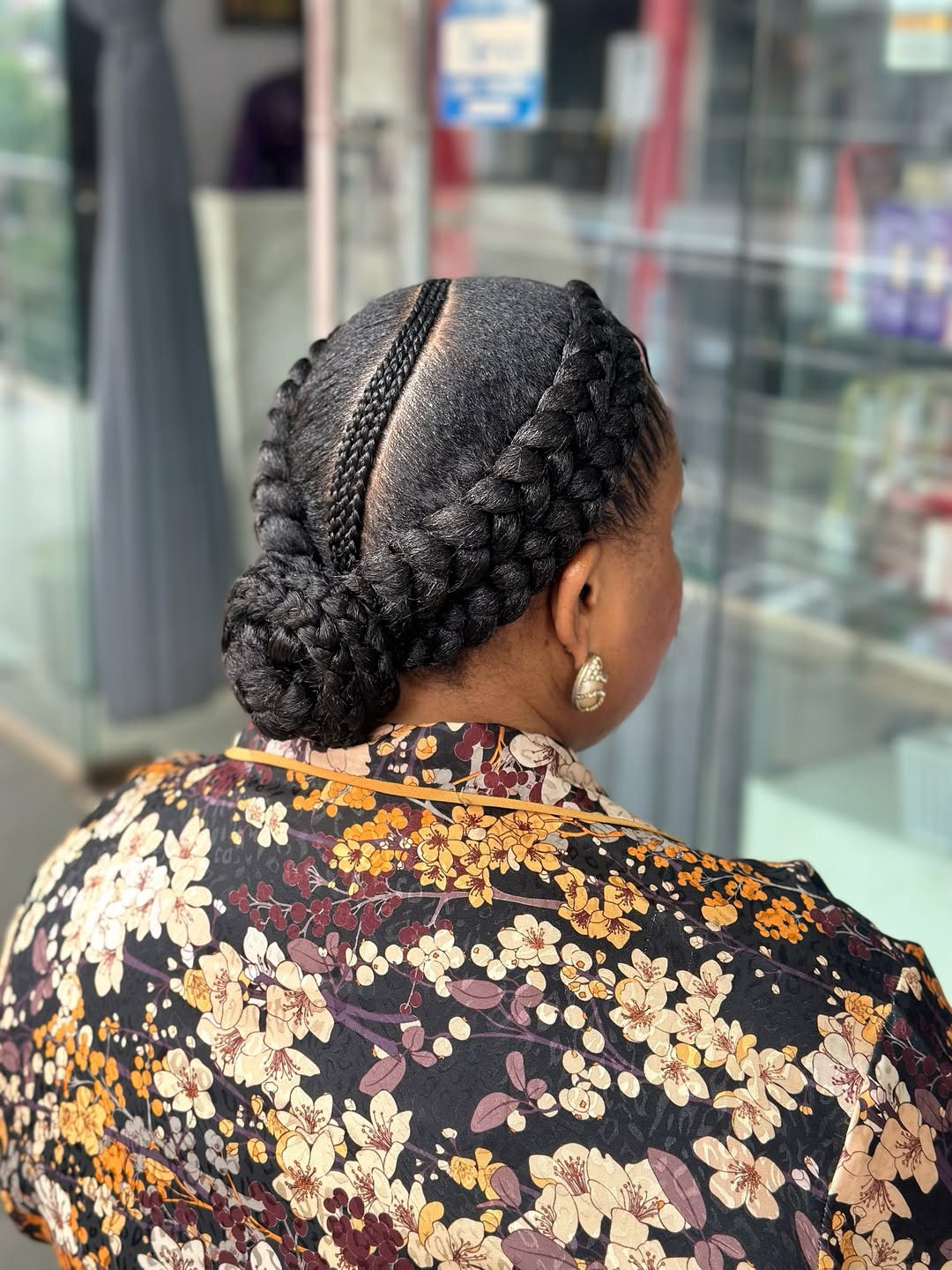 Elegant Cornrow Braids To Low Bun Hairstyle