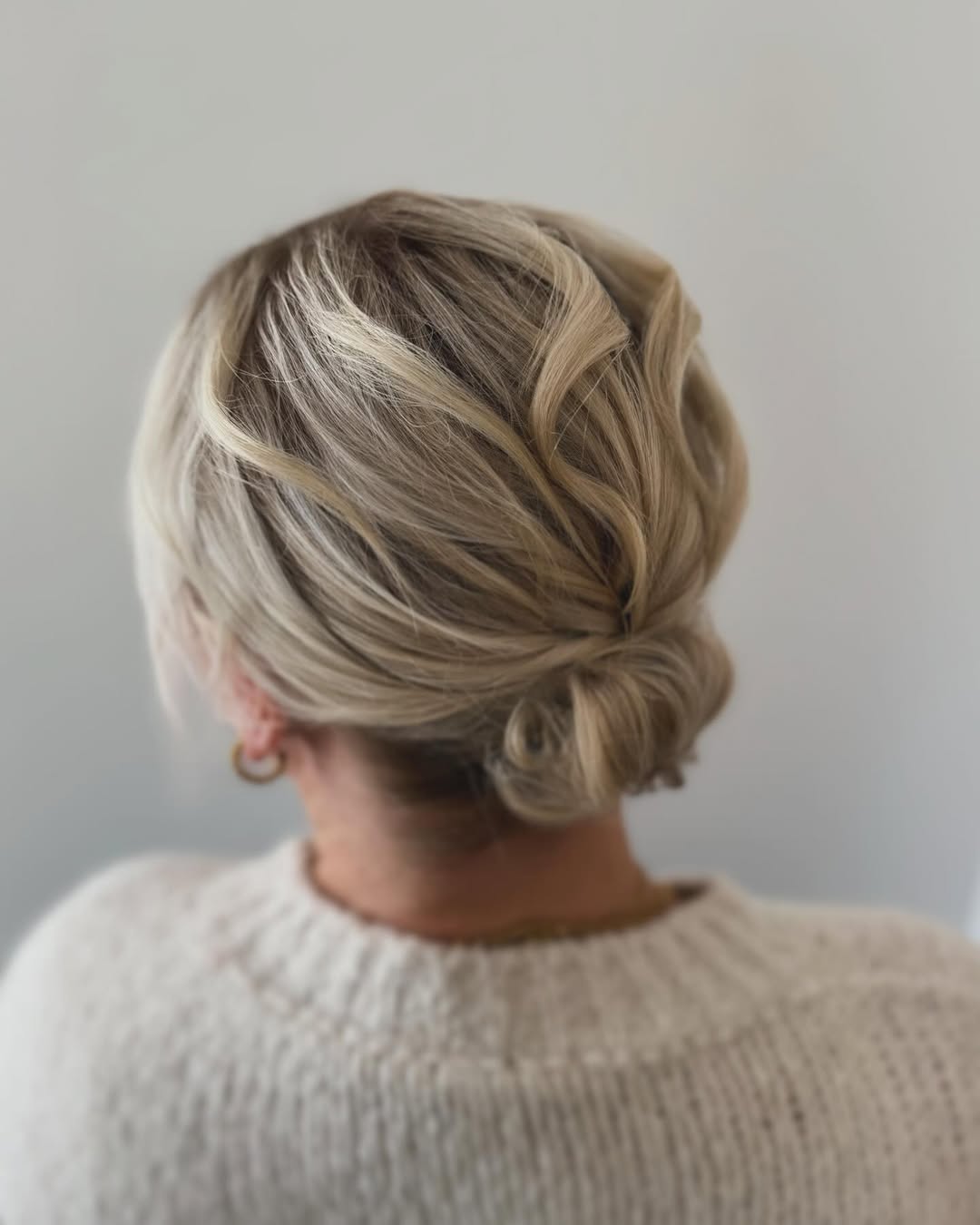 Elegant Textured Low Bun On Blonde Hair