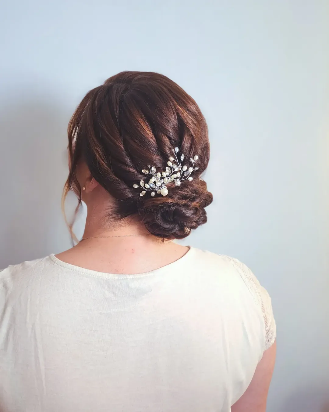 Elegant Twisted Low Updo With Pearl Accents