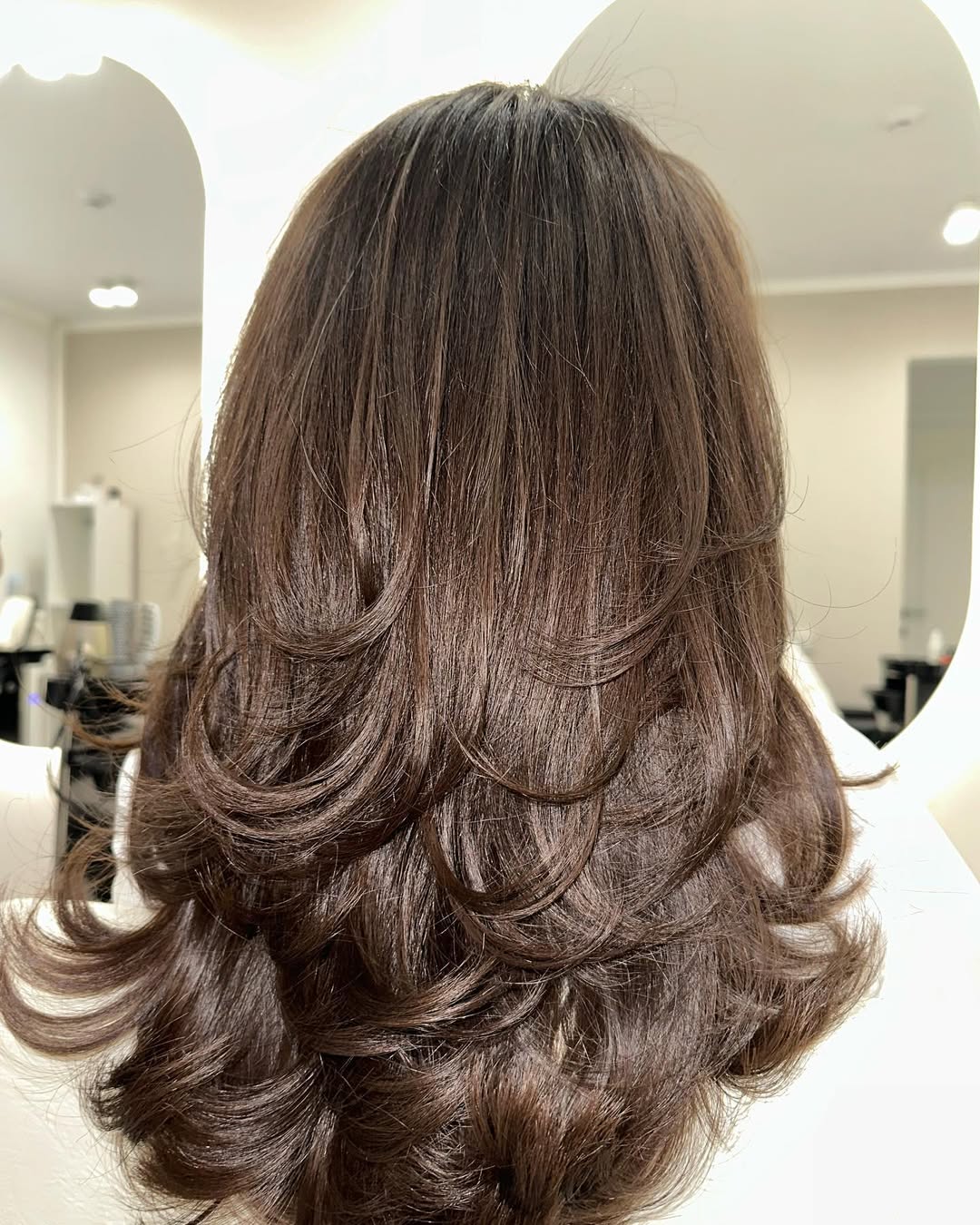 Full-Bodied Espresso Layers With Bouncy Curls