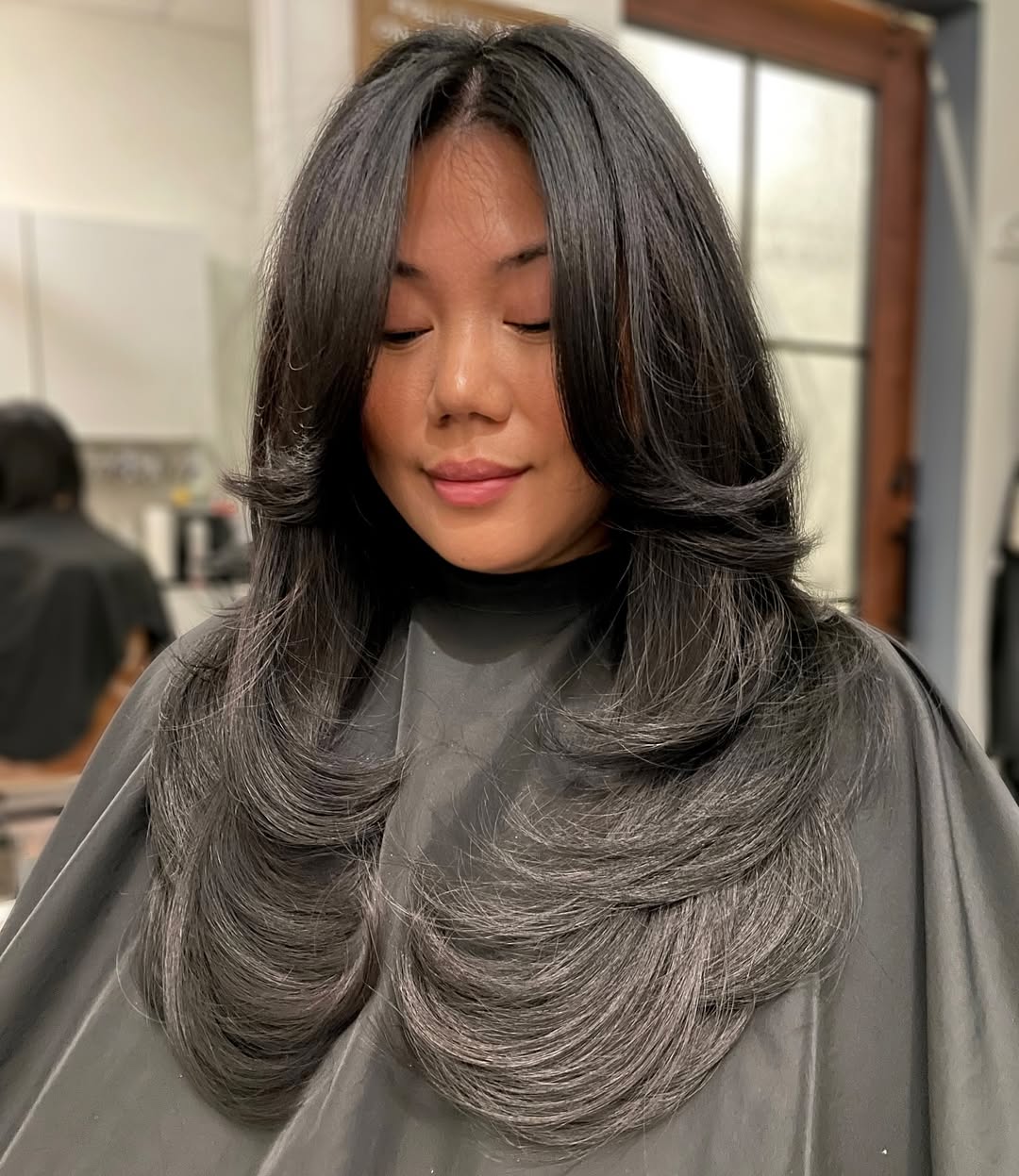 Glamorous Black Butterfly Cut With Face-Framing Layers