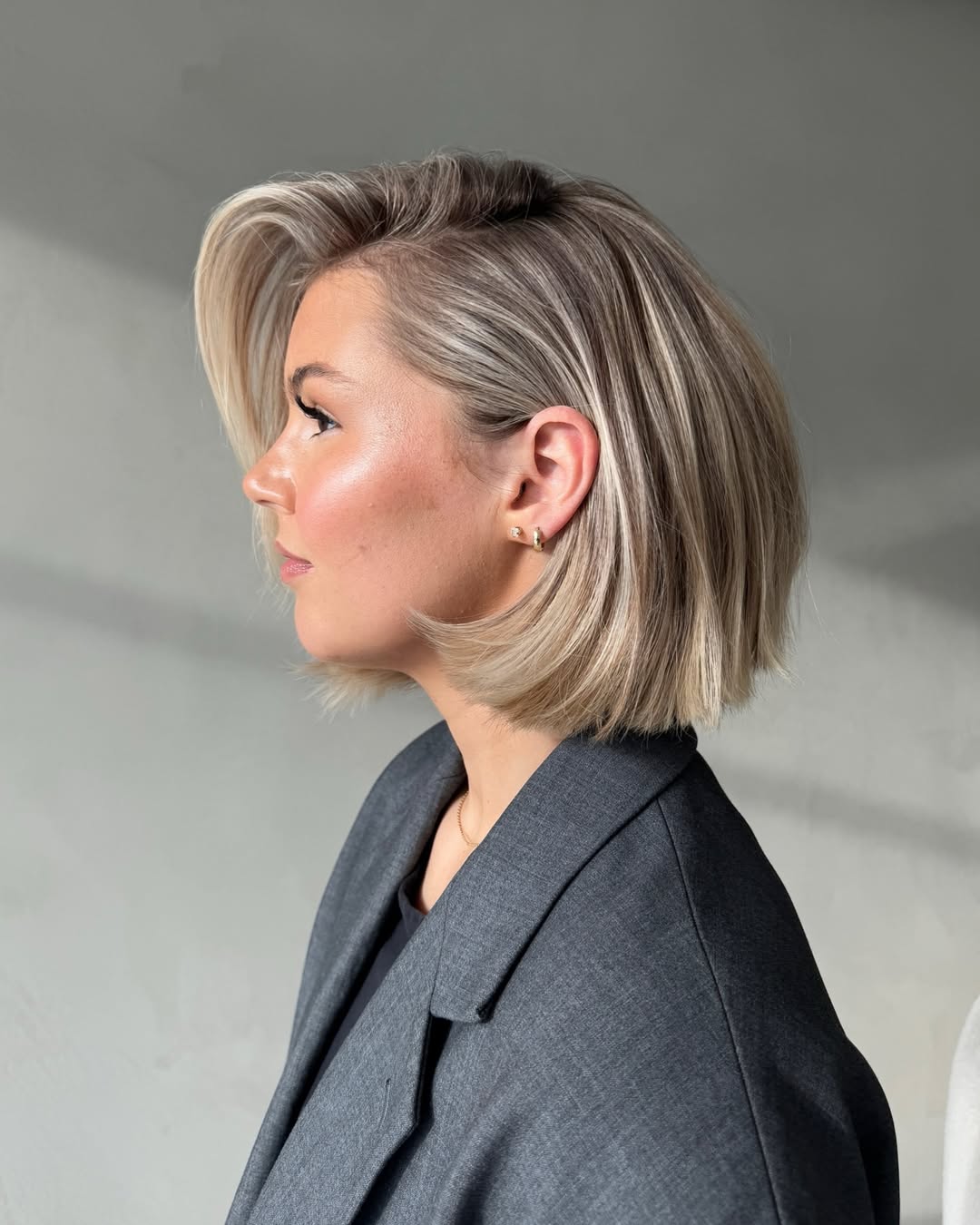 Glamorous Blonde Bob With Volume And Side Part